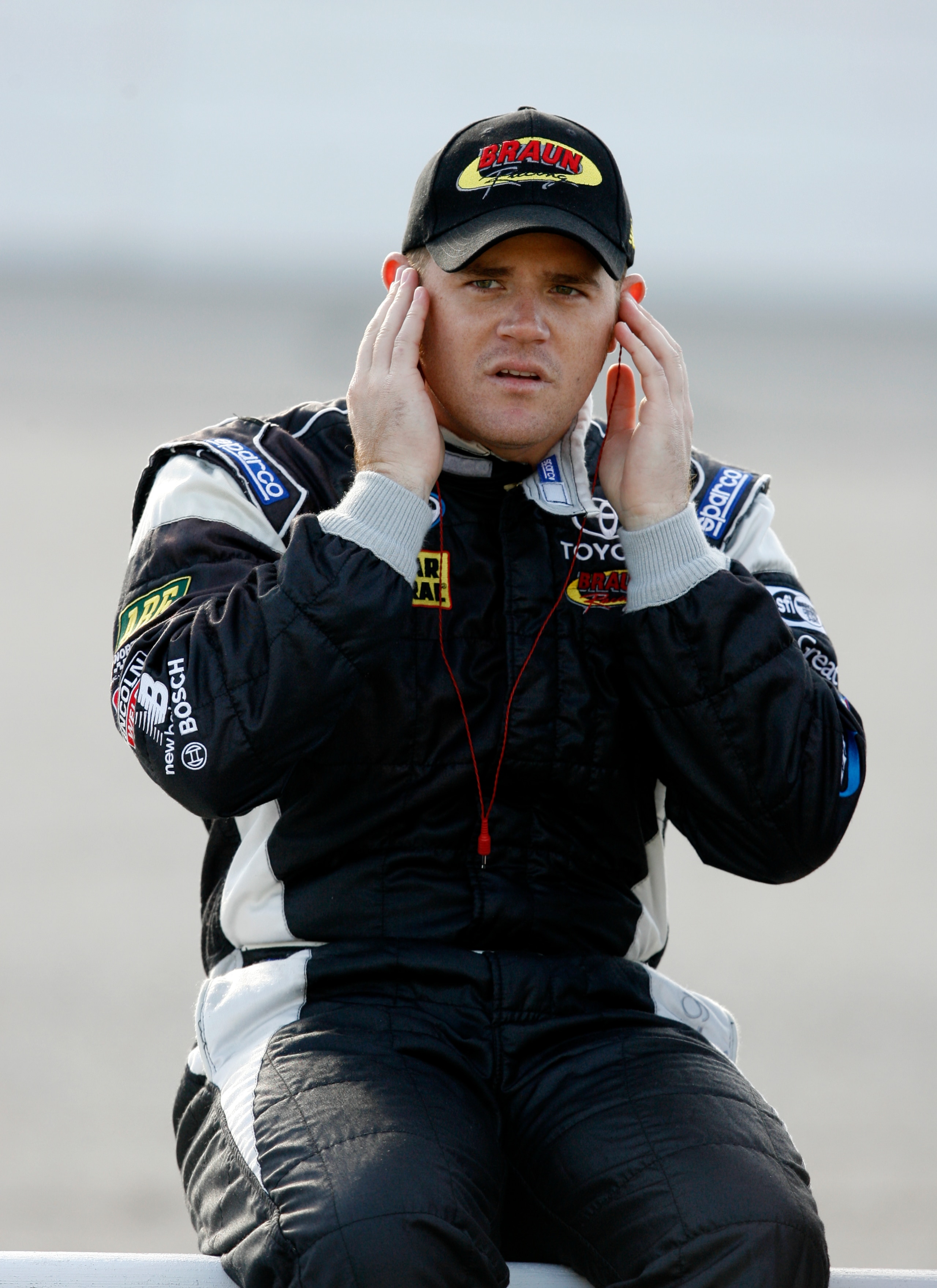 MEMPHIS, TN - OCTOBER 24: Justin Marks, driver of the #10 Cinstruct Corps Toyota sits on the wall on the grid during qualifying for the NASCAR Nationwide series Kroger 'On Track For Cure' 250 race at the Memphis Motorsports Park on October 24, 2009 in M MEMPHIS, TN - OCTOBER 24: Justin Marks, driver of the #10 Cinstruct Corps Toyota sits on the wall on the grid during qualifying for the NASCAR Nationwide series Kroger 'On Track For Cure' 250 race at the Memphis Motorsports Park on October 24, 2009 in M