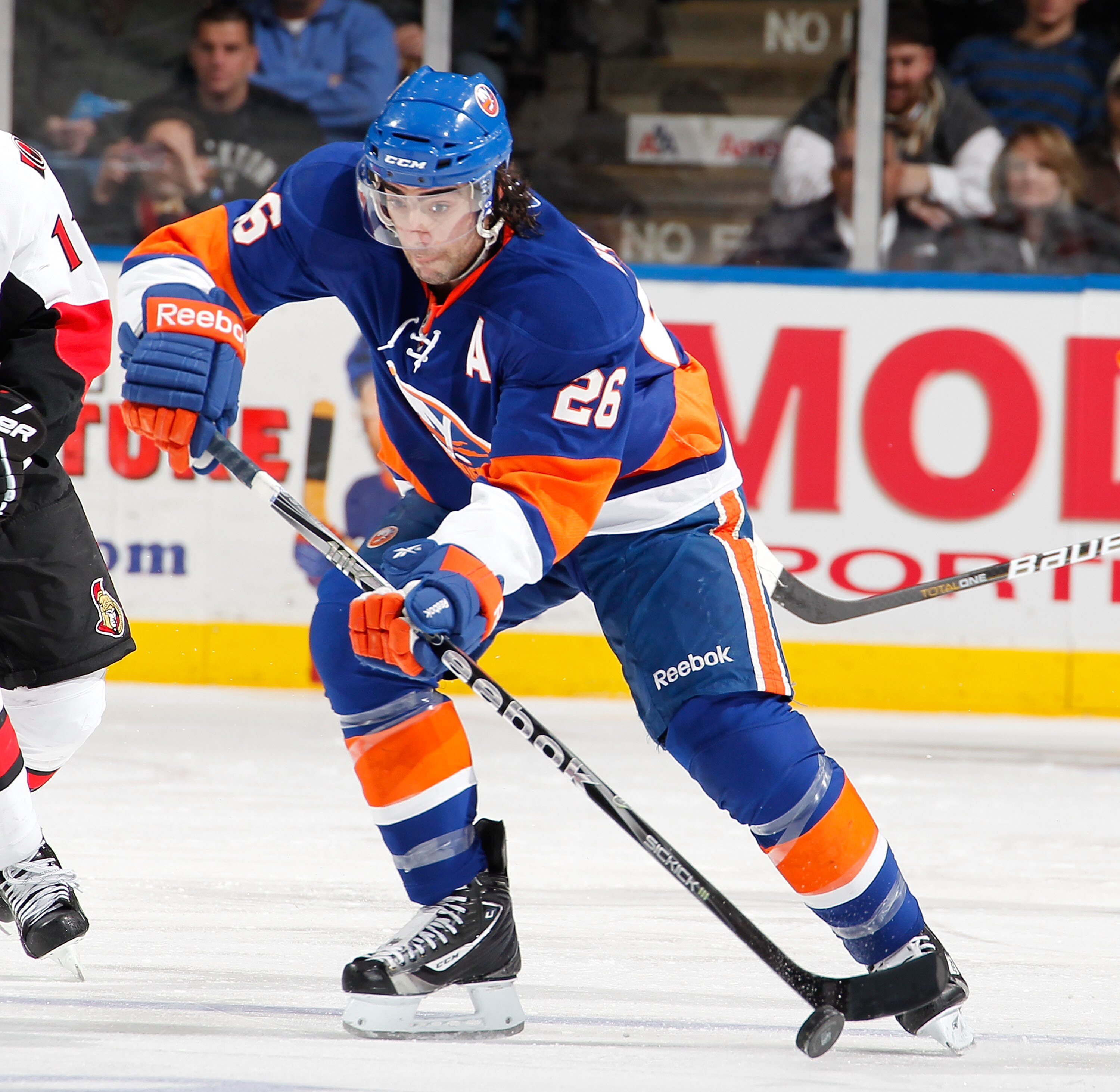 UNIONDALE, NY - JANUARY 13: Matt Moulson #26 of the New York Islanders skates during an NHL hockey game against the Ottawa Senators at the Nassau Coliseum on January 13, 2011 in Uniondale, New York. (Photo by Paul Bereswill/Getty Images) UNIONDALE, NY - JANUARY 13: Matt Moulson #26 of the New York Islanders skates during an NHL hockey game against the Ottawa Senators at the Nassau Coliseum on January 13, 2011 in Uniondale, New York. (Photo by Paul Bereswill/Getty Images)