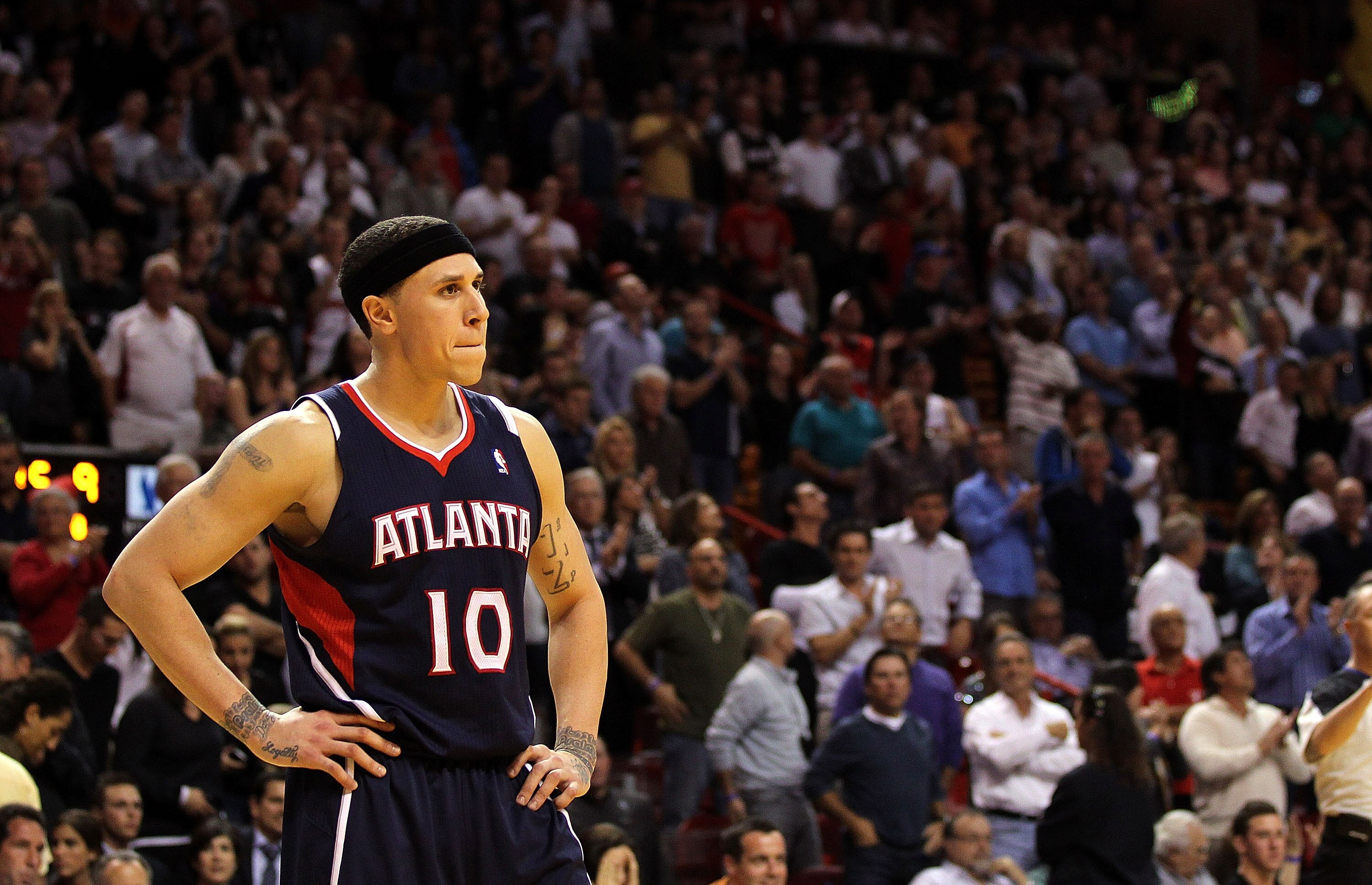 MIAMI, FL - JANUARY 18:  Mike Bibby #10 of the Atlanta Hawks looks on during a game against the Miami Heat at American Airlines Arena on January 18, 2011 in Miami, Florida. NOTE TO USER: User expressly acknowledges and agrees that, by downloading and/or u