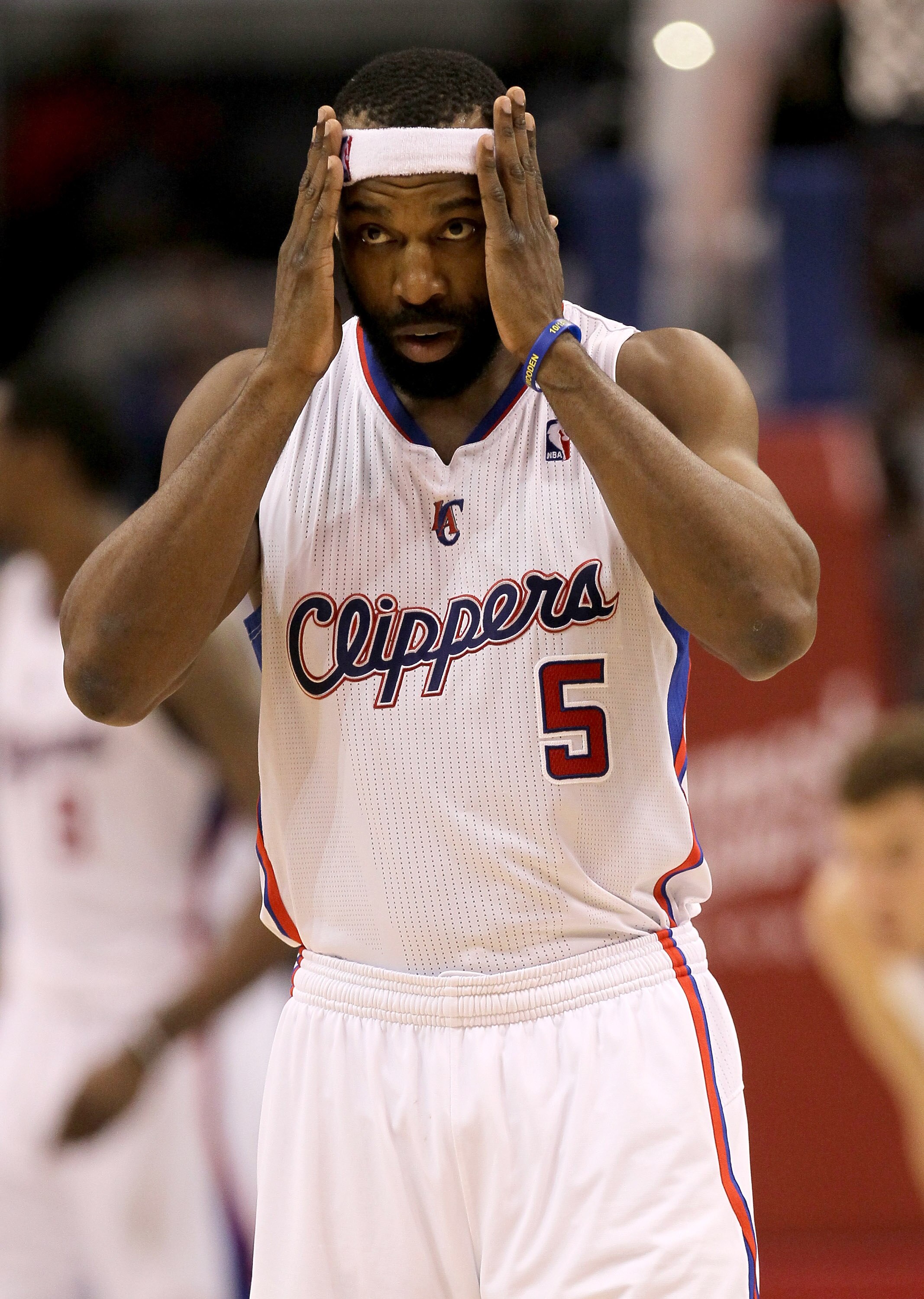 LOS ANGELES, CA - DECEMBER 22:  Baron Davis #5 of the Los Angeles Clippers adjusts his head band during the game with the Houston Rockets at Staples Center on December 22, 2010 in Los Angeles, California.  The Rockets won 97-92. NOTE TO USER: User express