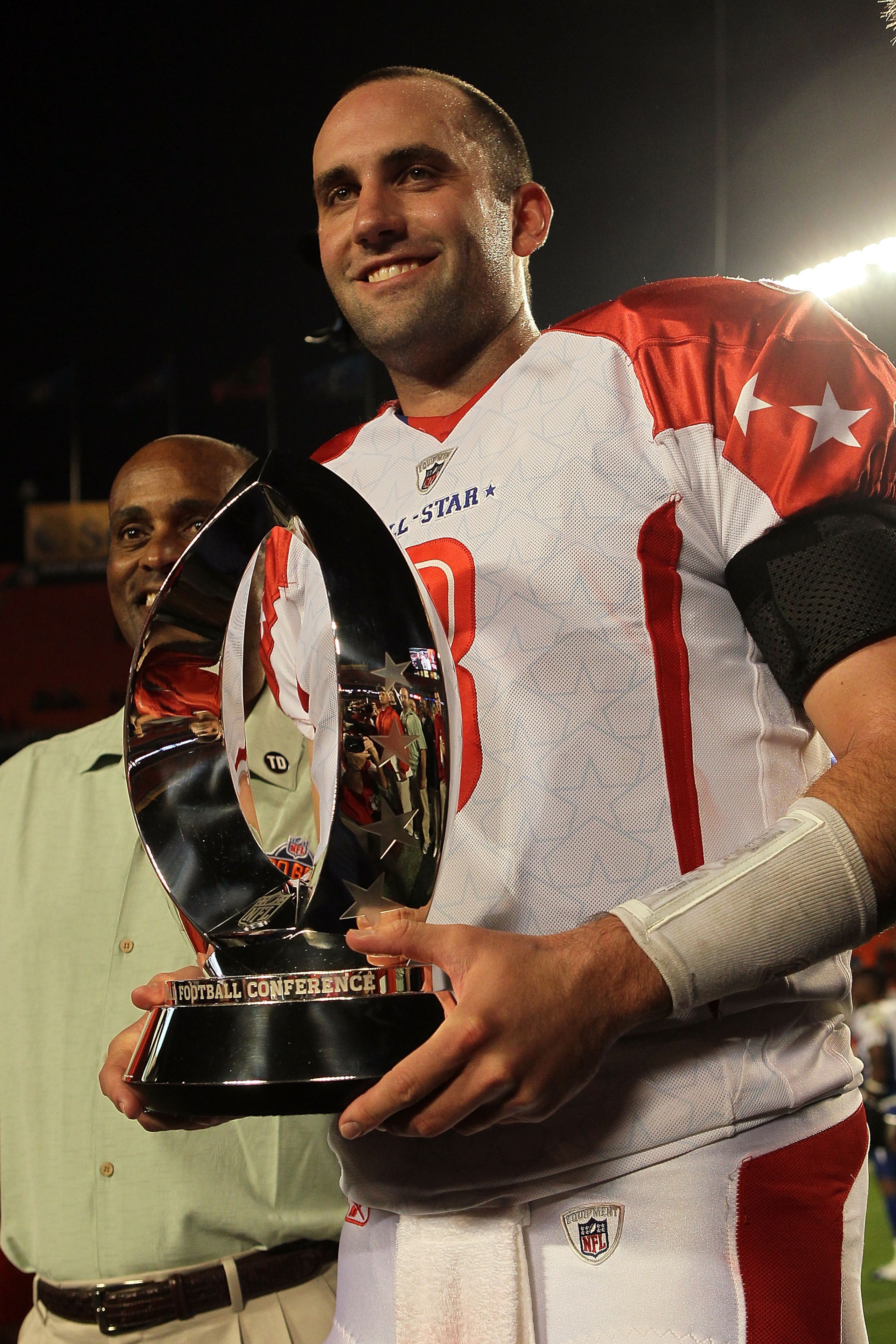 MIAMI GARDENS, FL - JANUARY 31:  Matt Schaub of the Houston Texans holds up the MVP trophy after the 2010 AFC-NFC Pro Bowl at Sun Life Stadium on January 31, 2010 in Miami Gardens, Florida.  (Photo by Scott Halleran/Getty Images)