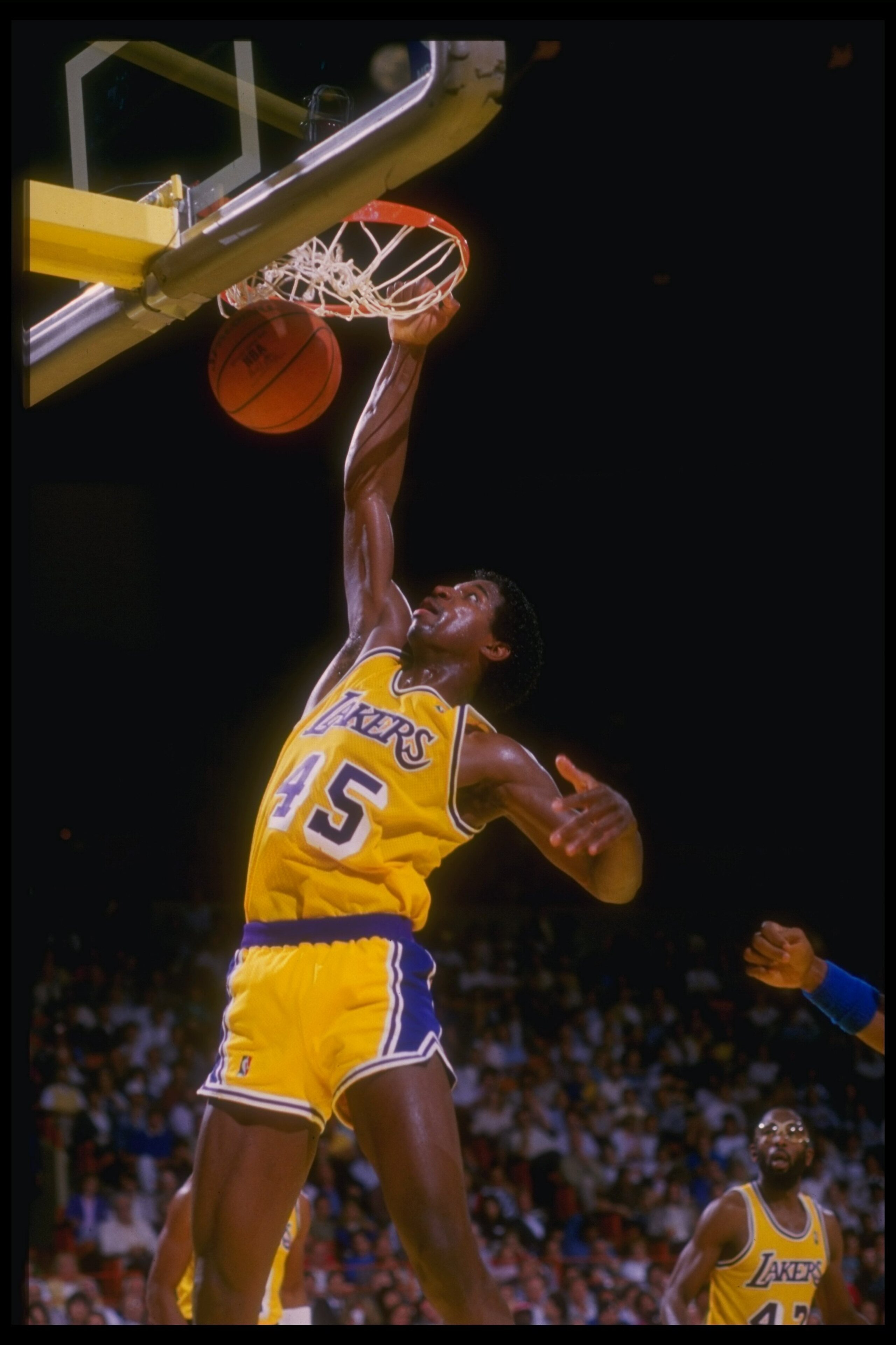 1989-90:  Forward A. C. Green of the Los Angeles Lakers slam dunks the ball during a game against the Golden State Warriors at the Great Western Forum in Inglewood, California. Mandatory Credit: Mike Powell  /Allsport Mandatory Credit: Mike Powell  /Allsp
