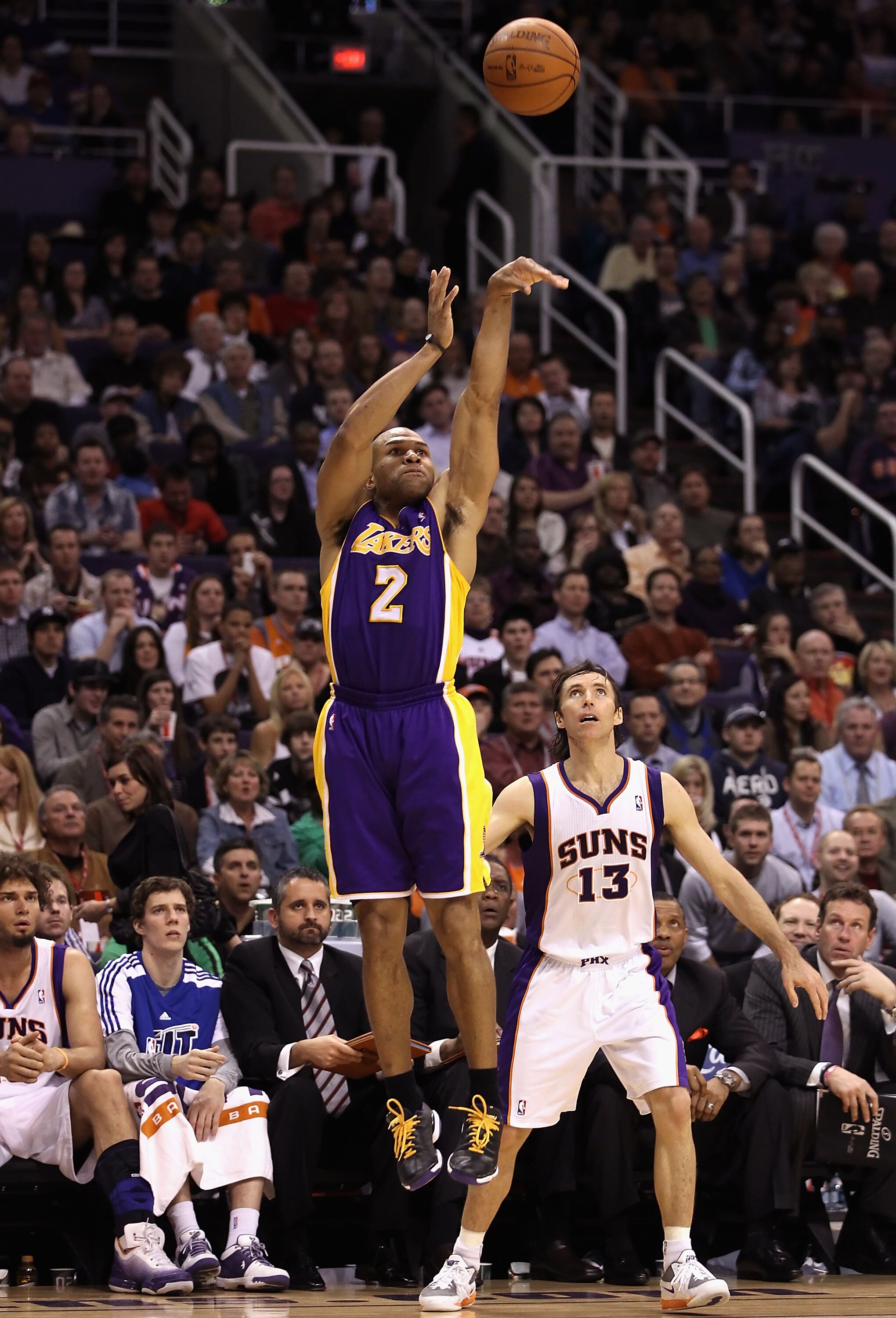PHOENIX, AZ - JANUARY 05:  Derek Fisher #2 of the Los Angeles Lakers puts up a shot against the Phoenix Suns during the NBA game at US Airways Center on January 5, 2011 in Phoenix, Arizona. The Lakers defeated the Suns 99-95.  NOTE TO USER: User expressly