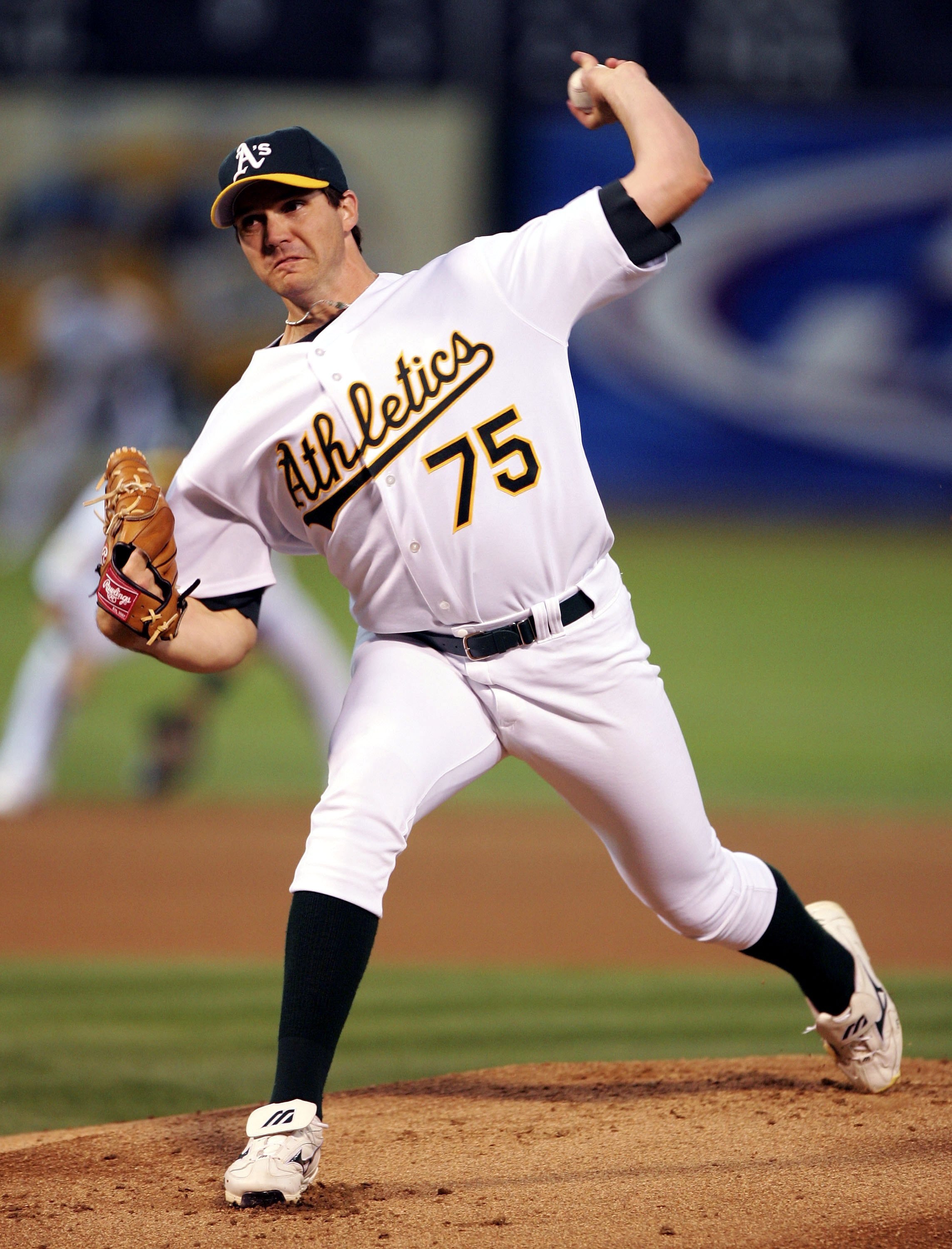 OAKLAND, CA - SEPTEMBER 22:  Barry Zito #75 of the Oakland Athletics pitches against the Los Angeles Angels of Anaheim at an MLB game at McAfee Coliseum on September 22, 2006 in Oakland, California.   (Photo by Jed Jacobsohn/Getty Images)