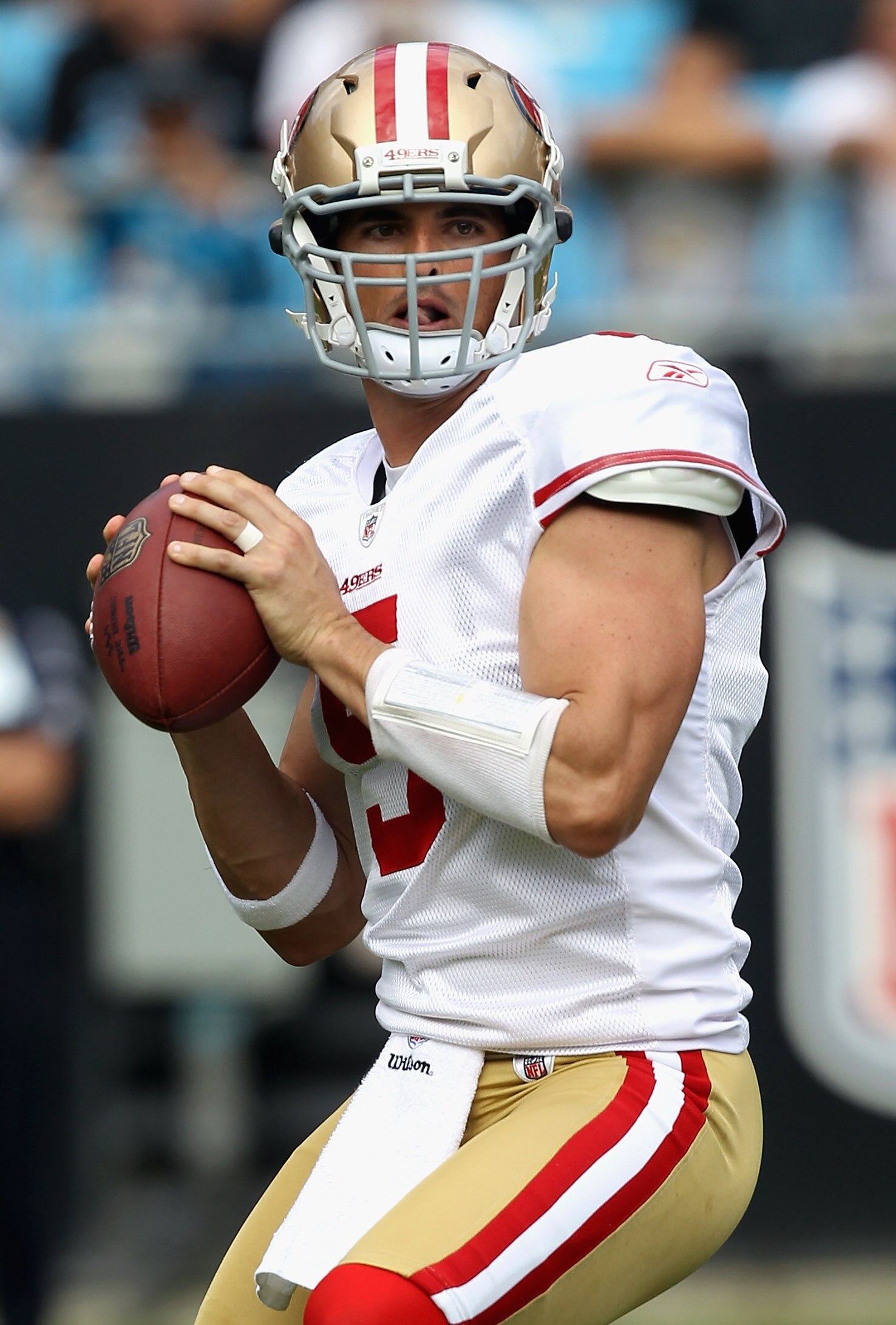 CHARLOTTE, NC - OCTOBER 24:  David Carr #5 of the San Francisco 49ers drops back to throw a pass against the Carolina Panthers during their game at Bank of America Stadium on October 24, 2010 in Charlotte, North Carolina.  (Photo by Streeter Lecka/Getty I