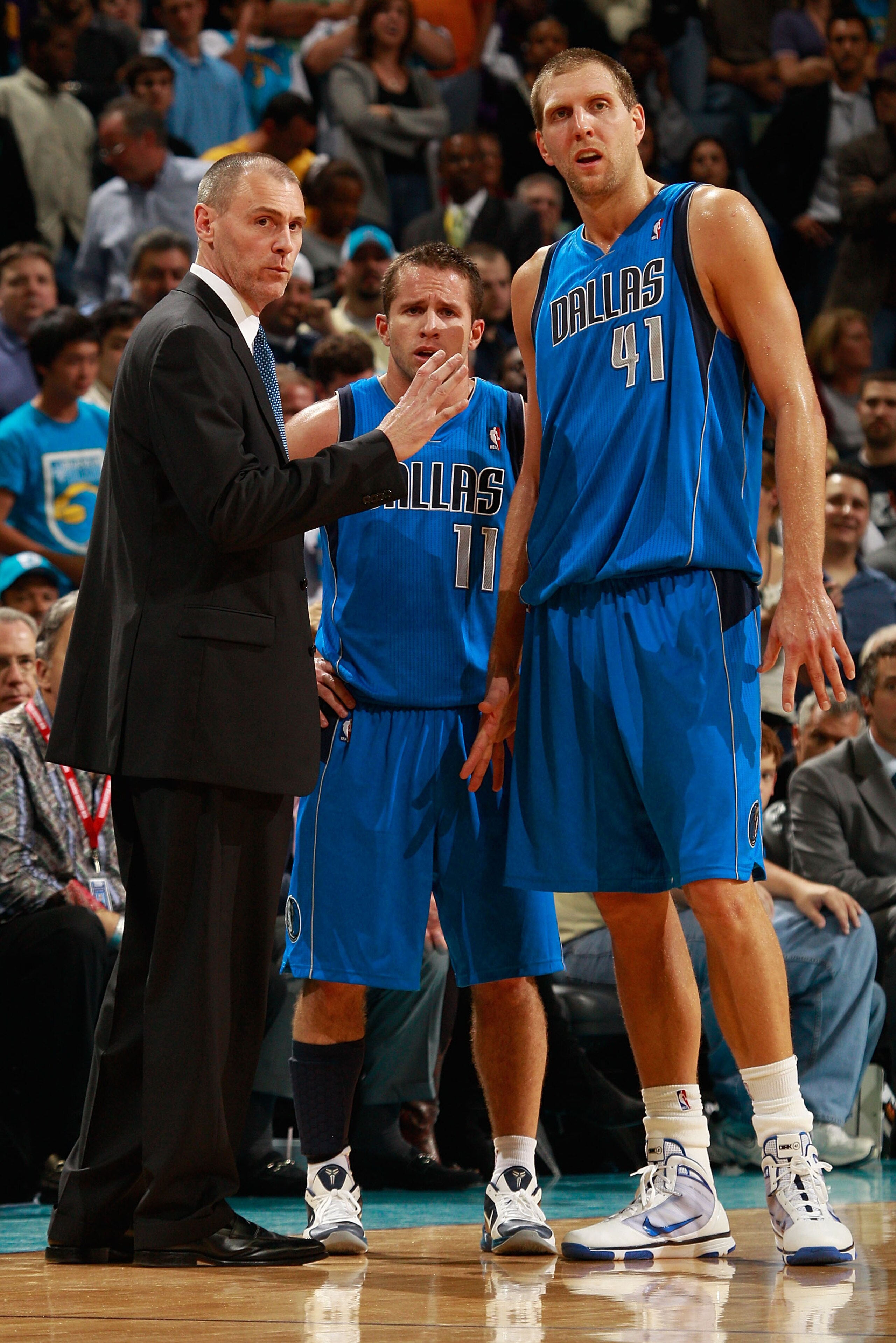 NEW ORLEANS - NOVEMBER 17: Head coach Rick Carlisle talks with Jose Barea #11 and Dirk Nowitzki #41 of the Dallas Mavericks during a timeout against the New Orleans Hornets at the New Orleans Arena on November 17, 2010 in New Orleans, Louisiana. The Hor NEW ORLEANS - NOVEMBER 17: Head coach Rick Carlisle talks with Jose Barea #11 and Dirk Nowitzki #41 of the Dallas Mavericks during a timeout against the New Orleans Hornets at the New Orleans Arena on November 17, 2010 in New Orleans, Louisiana. The Hor