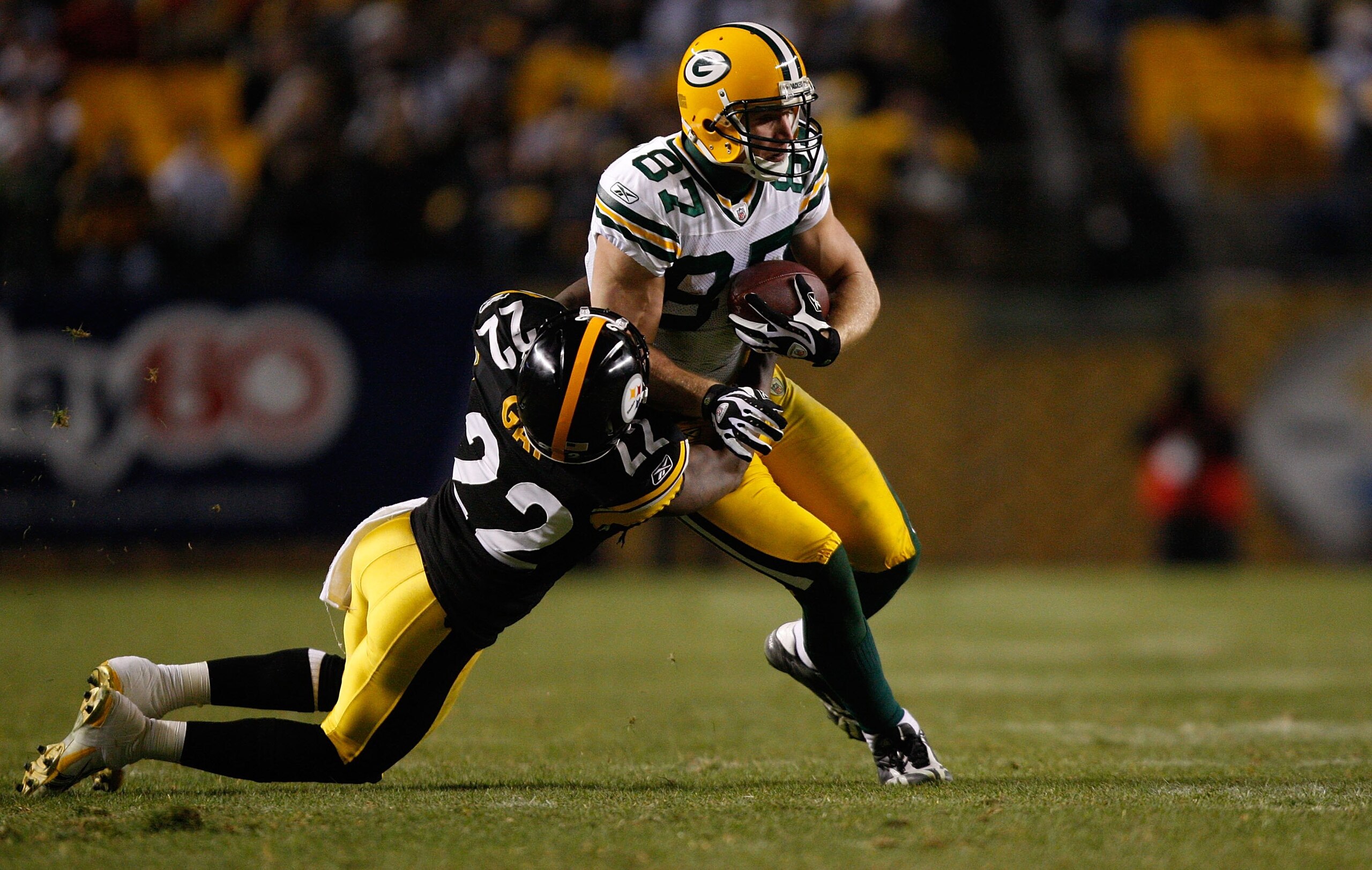 PITTSBURGH - DECEMBER 20: Jordy Nelson #87 of the Green Bay Packers fights off a tackle by William Gay #22 of the Pittsburgh Steelers during the game on December 20, 2009 at Heinz Field in Pittsburgh, Pennsylvania. (Photo by Jared Wickerham/Getty Images) PITTSBURGH - DECEMBER 20: Jordy Nelson #87 of the Green Bay Packers fights off a tackle by William Gay #22 of the Pittsburgh Steelers during the game on December 20, 2009 at Heinz Field in Pittsburgh, Pennsylvania. (Photo by Jared Wickerham/Getty Images)