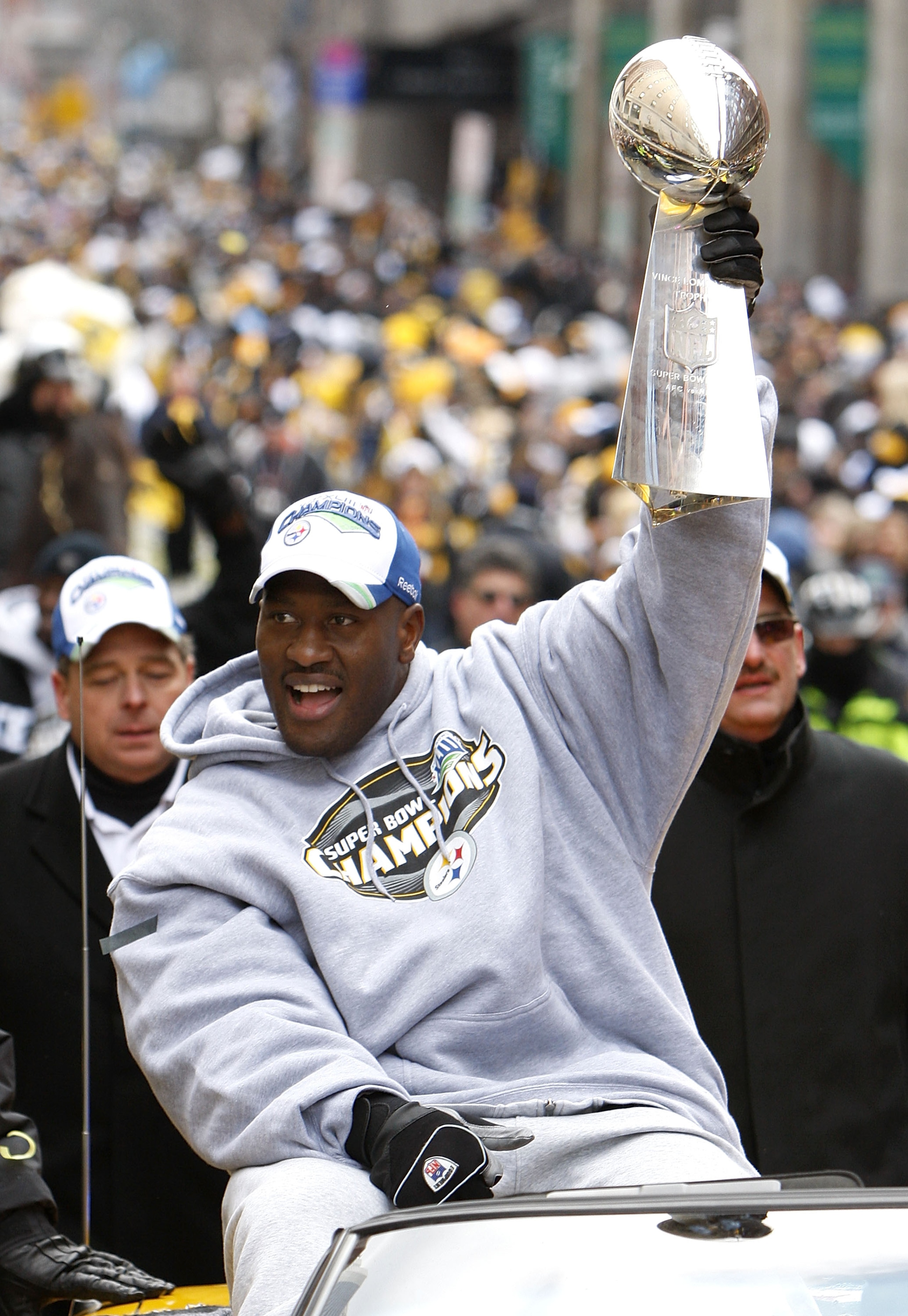 PITTSBURGH - FEBRUARY 03: James Harrison #92 of the Pittsburgh Steelers shows off the Super Bowl XLIII trophy during a parade on February 3, 2009 in Pittsburgh, Pennsylvania. (Photo by Gregory Shamus/Getty Images) PITTSBURGH - FEBRUARY 03: James Harrison #92 of the Pittsburgh Steelers shows off the Super Bowl XLIII trophy during a parade on February 3, 2009 in Pittsburgh, Pennsylvania. (Photo by Gregory Shamus/Getty Images)