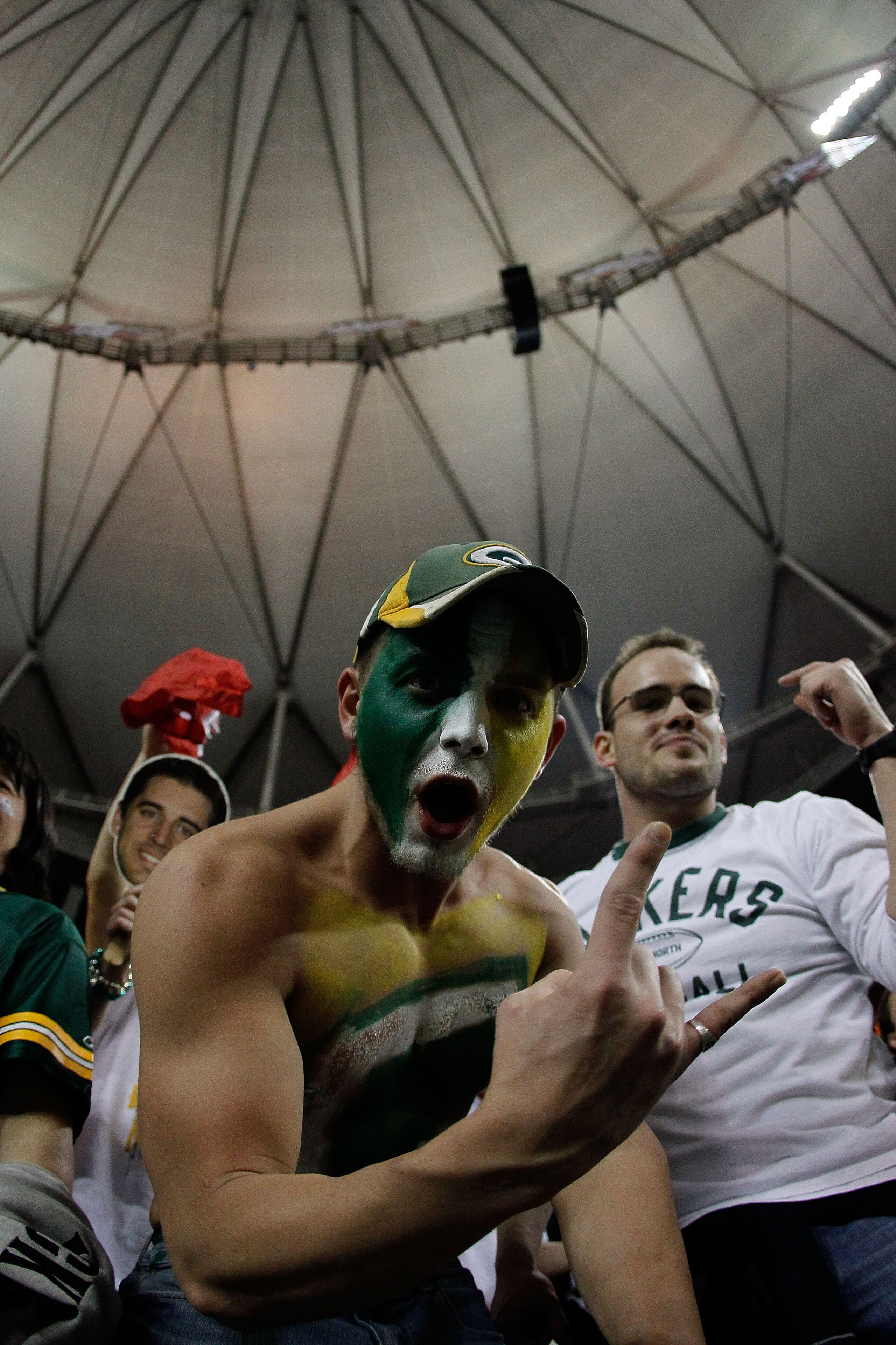 ATLANTA, GA - JANUARY 15: A fan of the Green Bay Packers celebrates after the Packers won 48-21 against the Atlanta Falcons during their 2011 NFC divisional playoff game at Georgia Dome on January 15, 2011 in Atlanta, Georgia. (Photo by Kevin C. Cox/Ge ATLANTA, GA - JANUARY 15: A fan of the Green Bay Packers celebrates after the Packers won 48-21 against the Atlanta Falcons during their 2011 NFC divisional playoff game at Georgia Dome on January 15, 2011 in Atlanta, Georgia. (Photo by Kevin C. Cox/Ge