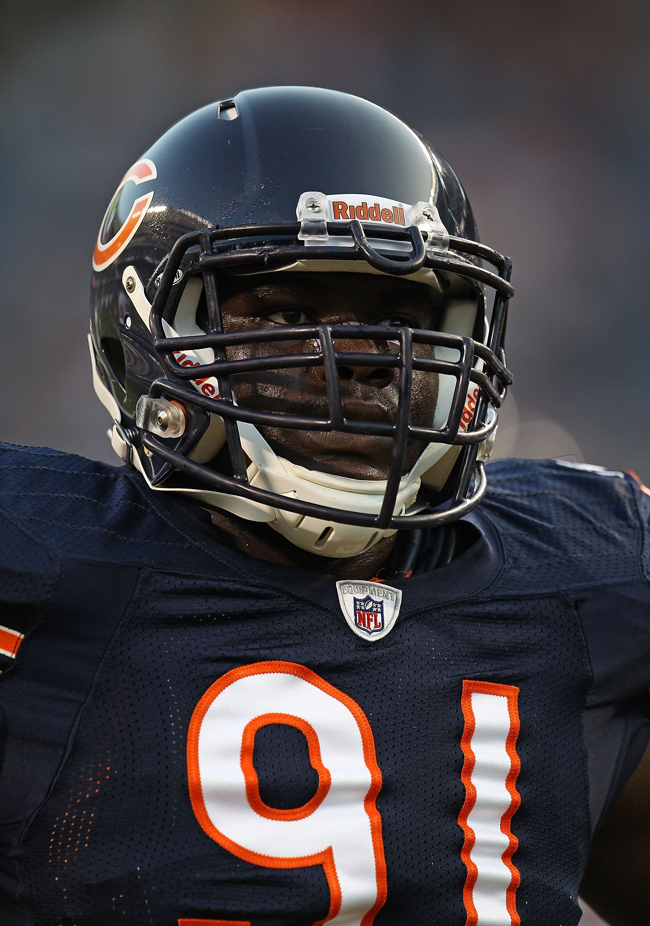 CHICAGO - AUGUST 21: Tommie Harris #91 of the Chicago Bears warms-up before a preseason game against the Oakland Raiders at Soldier Field on August 21, 2010 in Chicago, Illinois. The Raiders defeated the Bears 32-17. (Photo by Jonathan Daniel/Getty Images