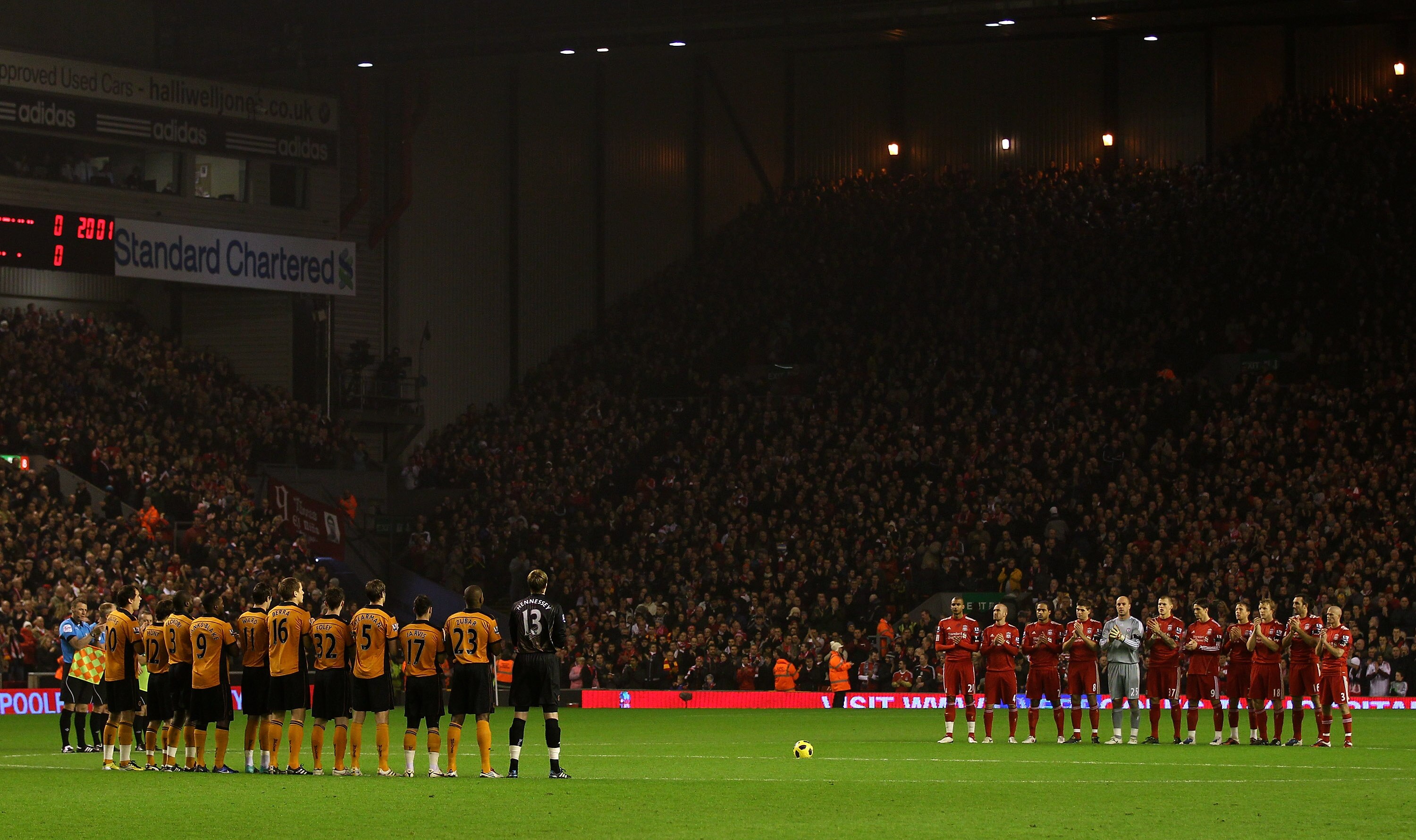 LIVERPOOL, ENGLAND - DECEMBER 29:  The Liverpool and Wolves players applaud to honour the memory of ex Liverpool player Avi Cohen who died this week from injuries sustained in a motorcycle accident, prior to the Barclays Premier League match between Liver