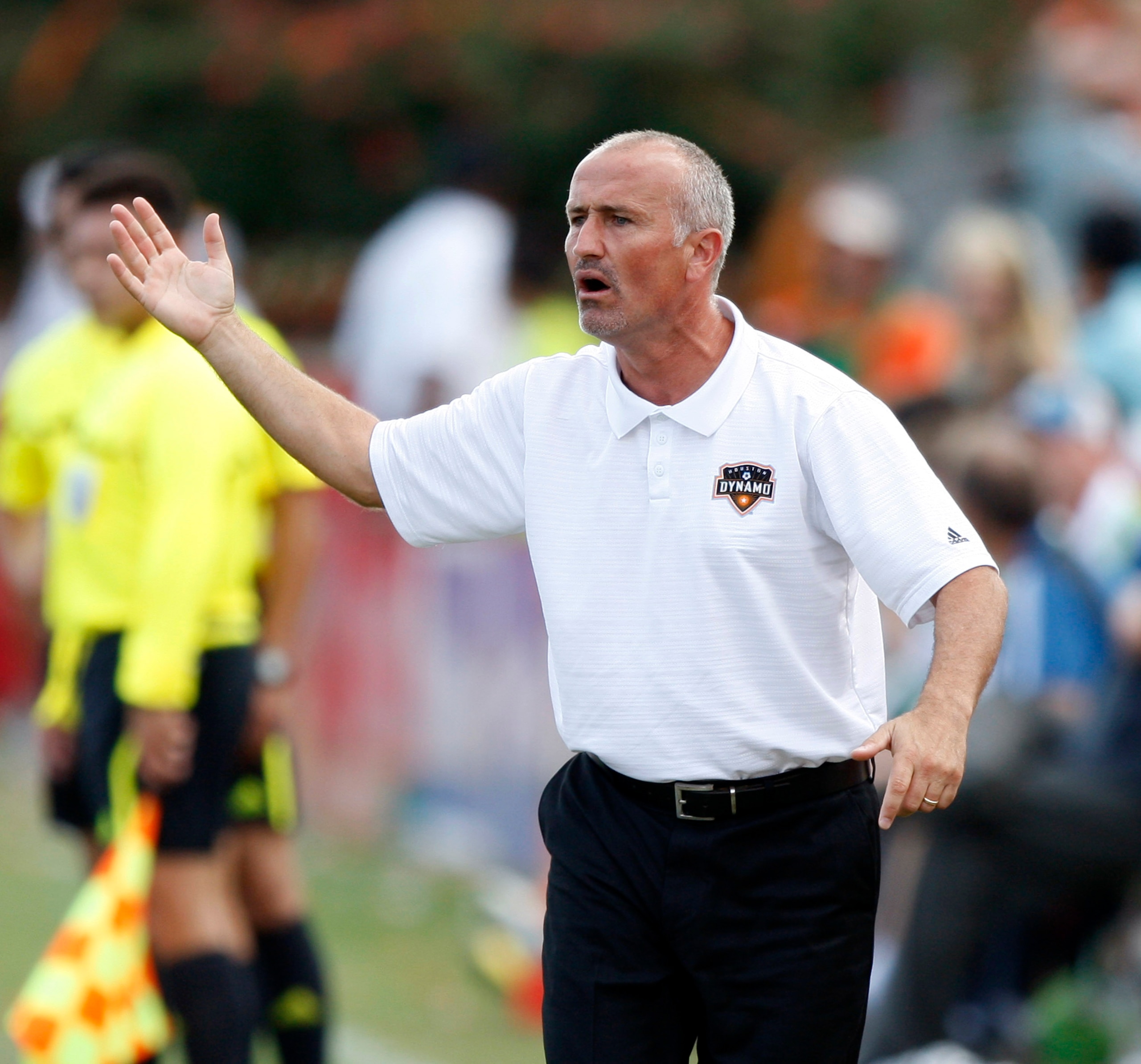 HOUSTON - OCTOBER 23: Dominic Kinnear, head coach of the Houston Dynamo reacts to a no call on a hand ball by the Seattle Sounders in the first half at Robertson Stadium on October 23, 2010 in Houston, Texas. (Photo by Bob Levey/Getty Images) HOUSTON - OCTOBER 23: Dominic Kinnear, head coach of the Houston Dynamo reacts to a no call on a hand ball by the Seattle Sounders in the first half at Robertson Stadium on October 23, 2010 in Houston, Texas. (Photo by Bob Levey/Getty Images)