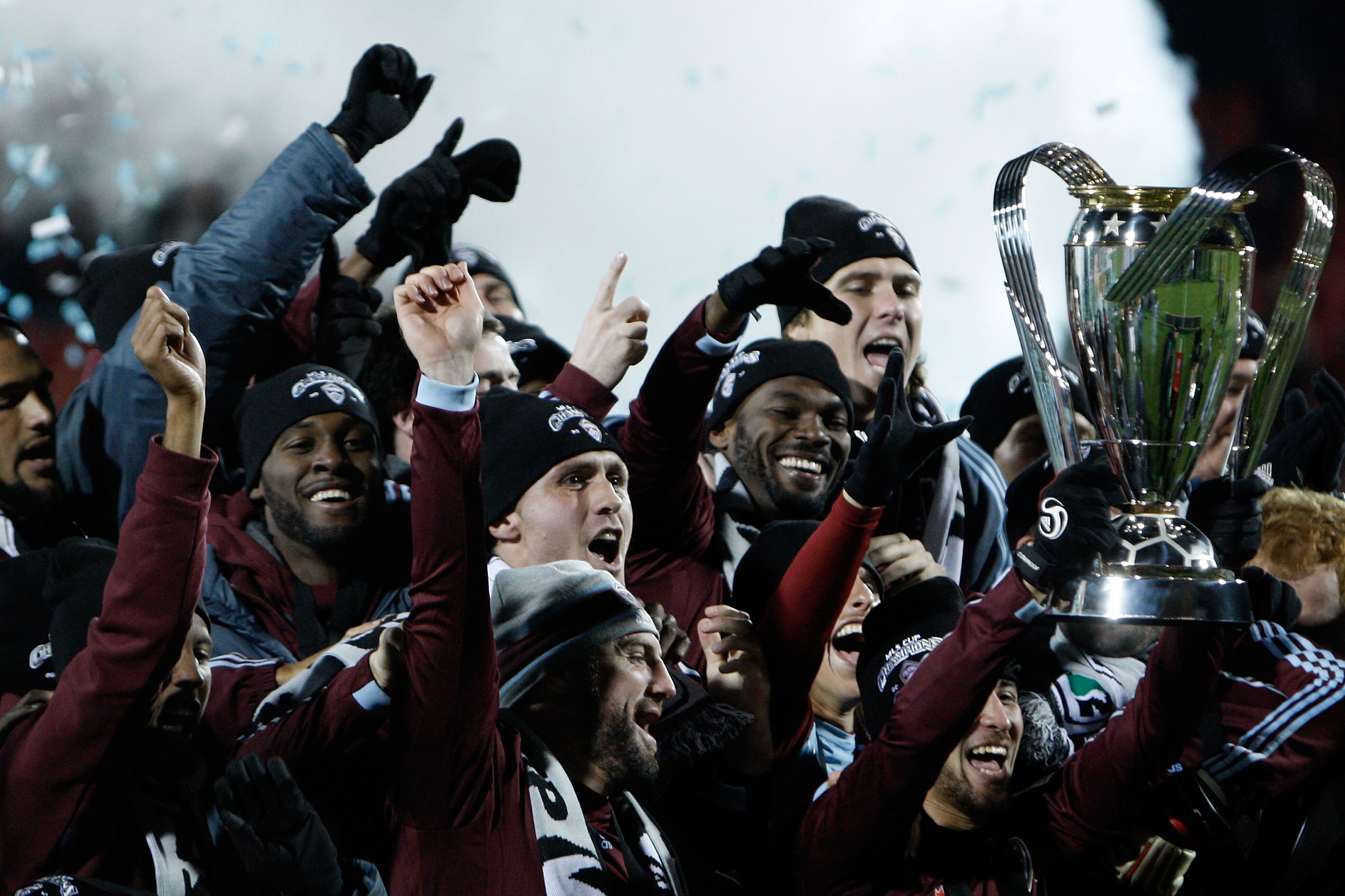 TORONTO, ON - NOVEMBER 21:  Kosuke Kimura #27 of the Colorado Rapids holds the Philip F. Anschutz Trophy and celebrates with teammates after their 2-1 overtime victory against FC Dallas during the 2010 MLS Cup match at BMO Field on November 21, 2010 in To