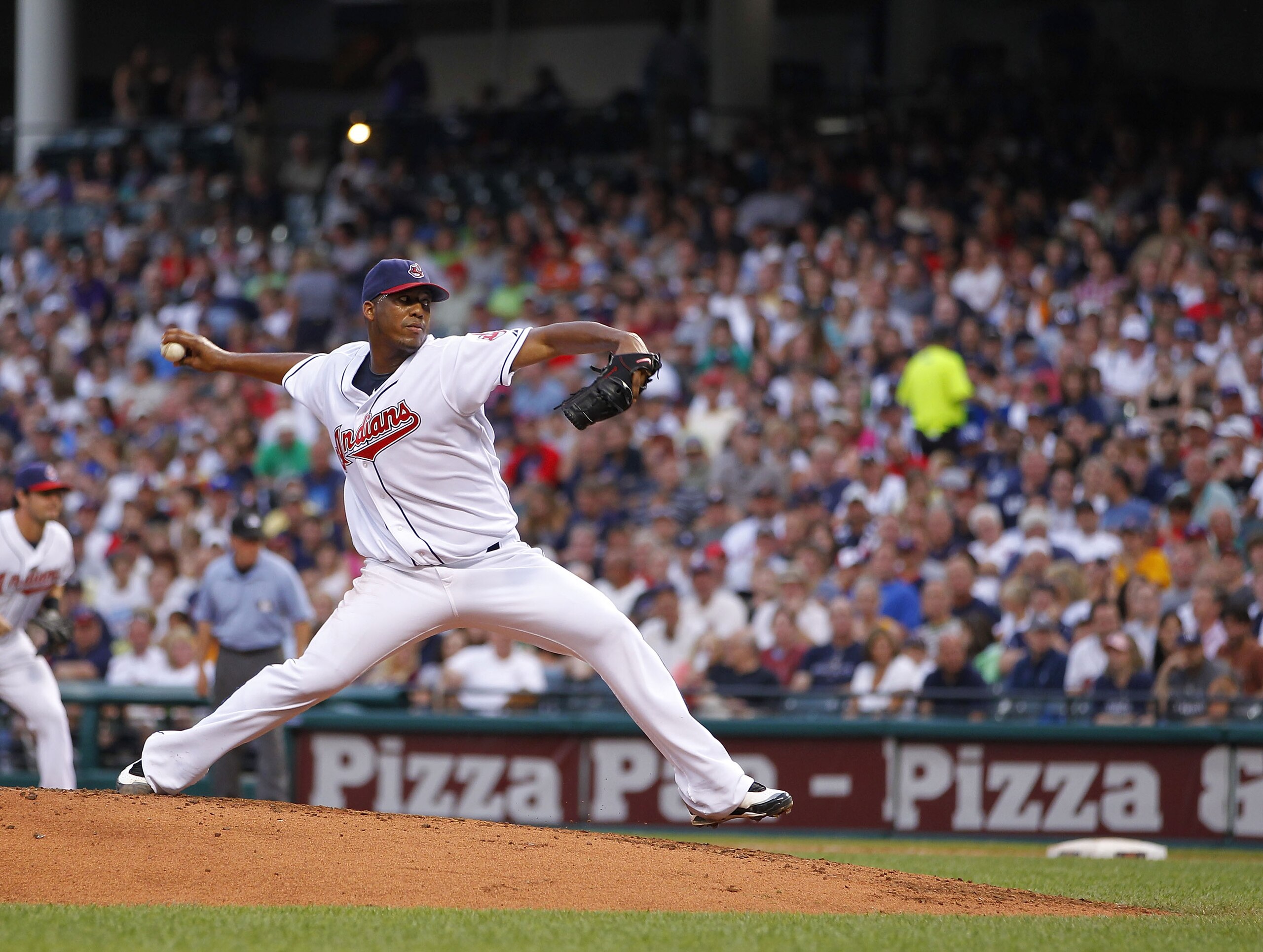 CLEVELAND - JULY 28: Fausto Carmona #55 of the Cleveland Indians throws a second inning pitch while playing the New York Yankees on July 28, 2010 at Progressive Field in Cleveland, Ohio. (Photo by Gregory Shamus/Getty Images) CLEVELAND - JULY 28: Fausto Carmona #55 of the Cleveland Indians throws a second inning pitch while playing the New York Yankees on July 28, 2010 at Progressive Field in Cleveland, Ohio. (Photo by Gregory Shamus/Getty Images)