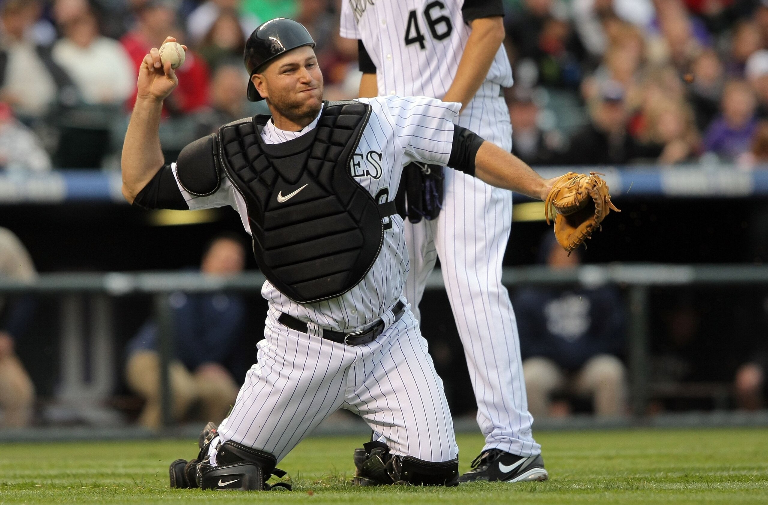 DENVER - APRIL 10: Catcher Chris Iannetta #20 of the Colorado Rockies throws out a runner against the San Diego Padres during MLB action at Coors Field on April 10, 2010 in Denver, Colorado. The Padres defeated the Rockies 5-4 in 14 innings. (Photo by D DENVER - APRIL 10: Catcher Chris Iannetta #20 of the Colorado Rockies throws out a runner against the San Diego Padres during MLB action at Coors Field on April 10, 2010 in Denver, Colorado. The Padres defeated the Rockies 5-4 in 14 innings. (Photo by D