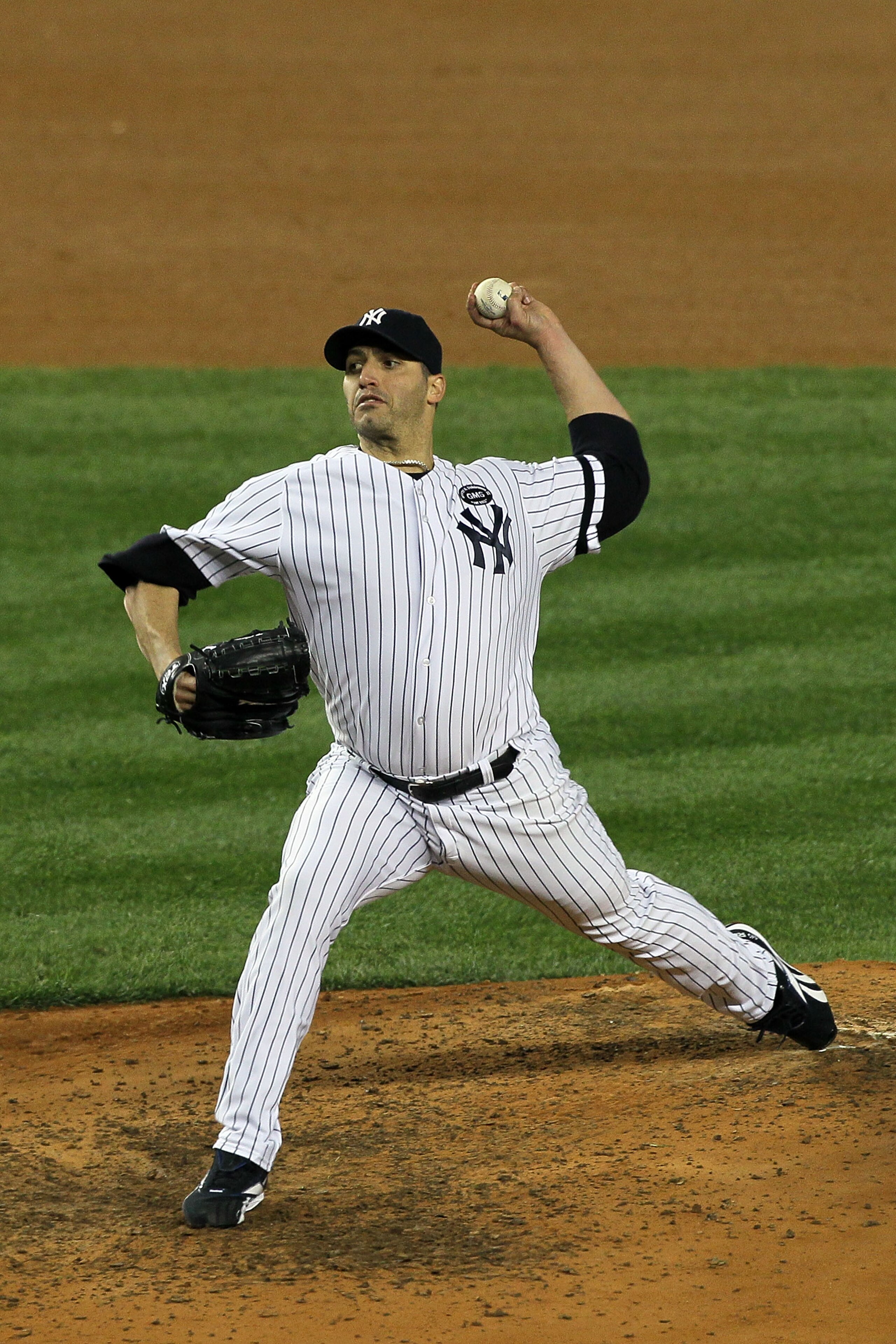 NEW YORK - OCTOBER 18: Starting pitcher Andy Pettitte #46 of the New York Yankees pitches against the Texas Rangers in Game Three of the ALCS during the 2010 MLB Playoffs at Yankee Stadium on October 18, 2010 in New York, New York. The Raners won 8-0. ( NEW YORK - OCTOBER 18: Starting pitcher Andy Pettitte #46 of the New York Yankees pitches against the Texas Rangers in Game Three of the ALCS during the 2010 MLB Playoffs at Yankee Stadium on October 18, 2010 in New York, New York. The Raners won 8-0. (