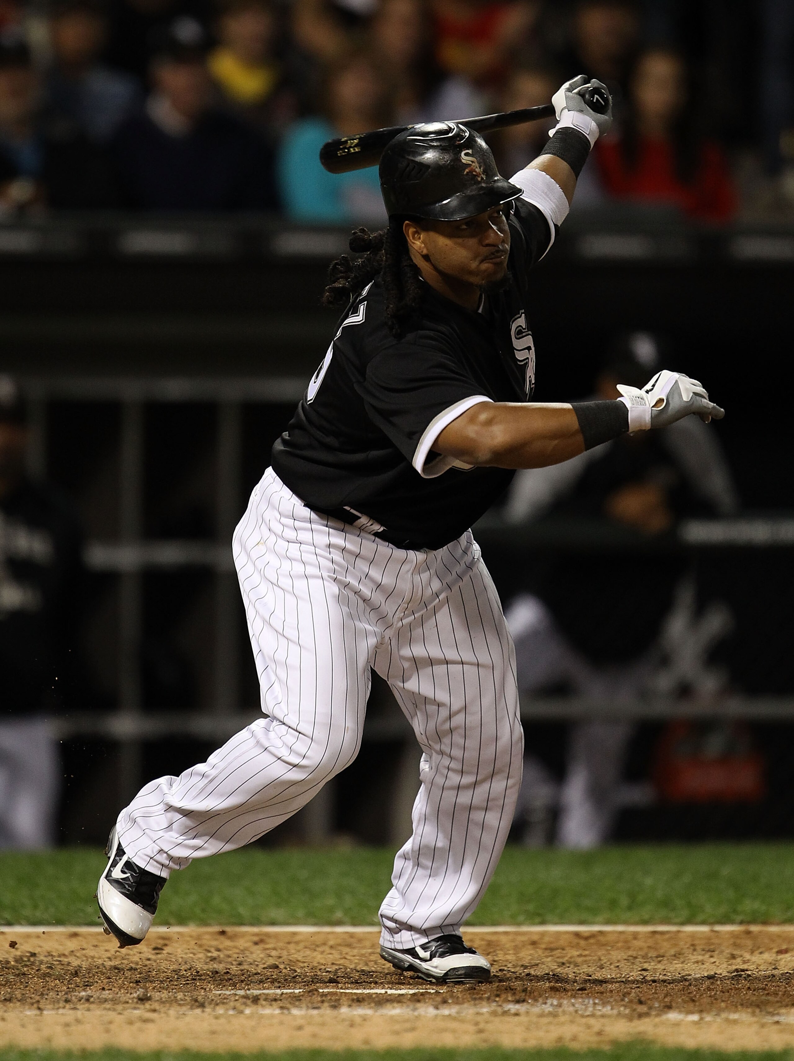 CHICAGO - SEPTEMBER 14: Manny Ramirez #99 of the Chicago White Sox strikes out with the bases loaded in the 7th inning against the Minnesota Twins at U.S. Cellular Field on September 14, 2010 in Chicago, Illinois. The Twins defeated the White Sox 9-3. (Ph CHICAGO - SEPTEMBER 14: Manny Ramirez #99 of the Chicago White Sox strikes out with the bases loaded in the 7th inning against the Minnesota Twins at U.S. Cellular Field on September 14, 2010 in Chicago, Illinois. The Twins defeated the White Sox 9-3. (Ph