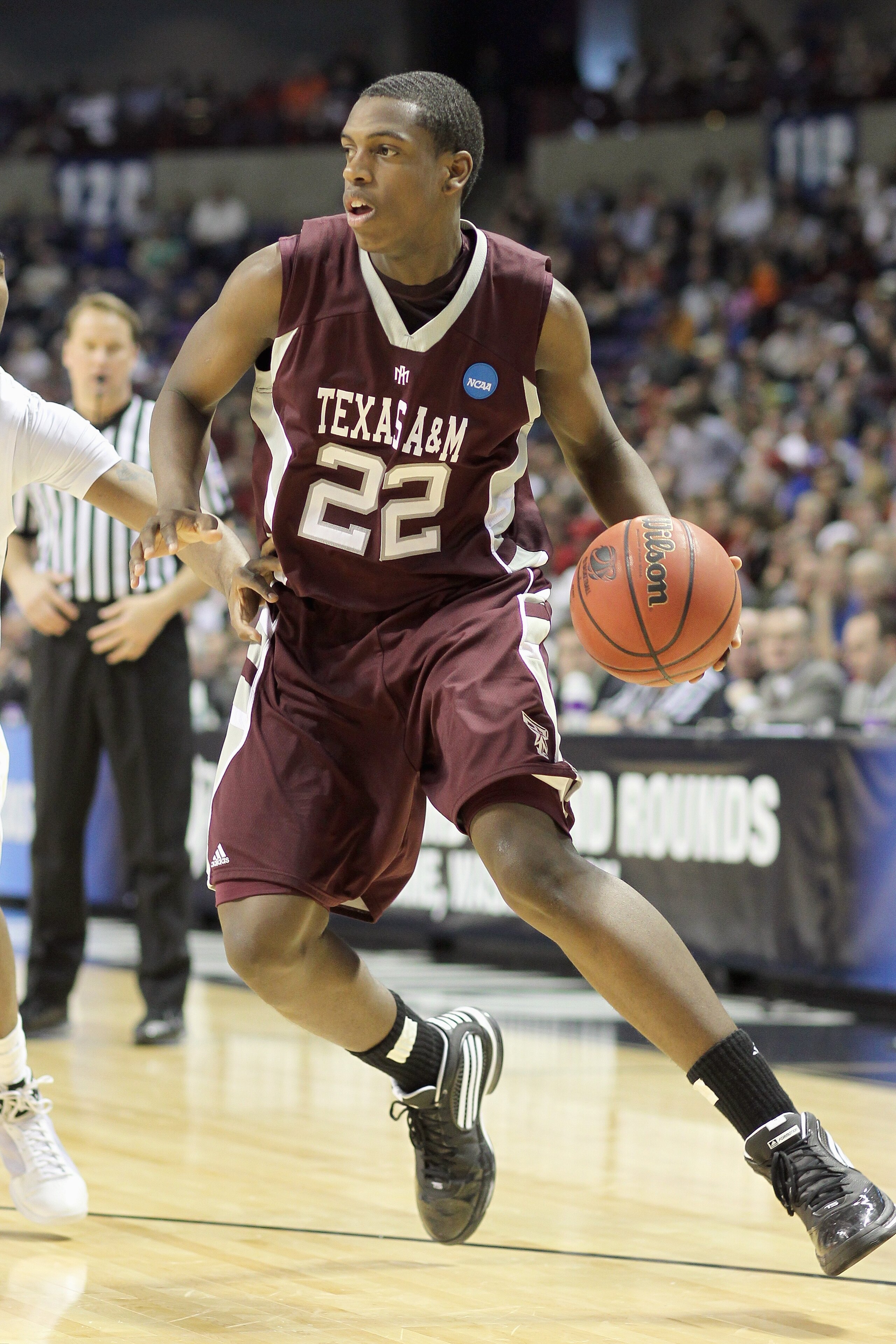 SPOKANE, WA - MARCH 21: Khris Middleton #22 of the Texas A&M Aggies drives the ball against the Purdue Boilermakers during the second round of the 2010 NCAA men's basketball tournament at the Spokane Arena on March 21, 2010 in Spokane, Washington. Purdue 