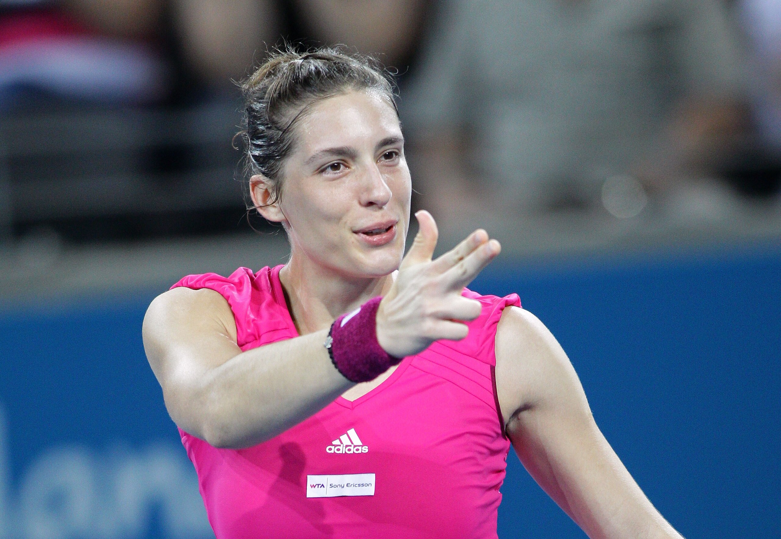 BRISBANE, AUSTRALIA - JANUARY 07:  Andrea Petkovic of Germany celebrates victory after her semi final match against Marion Bartoli of France during day six of the Brisbane International at Queensland Tennis Centre on January 7, 2011 in Brisbane, Australia