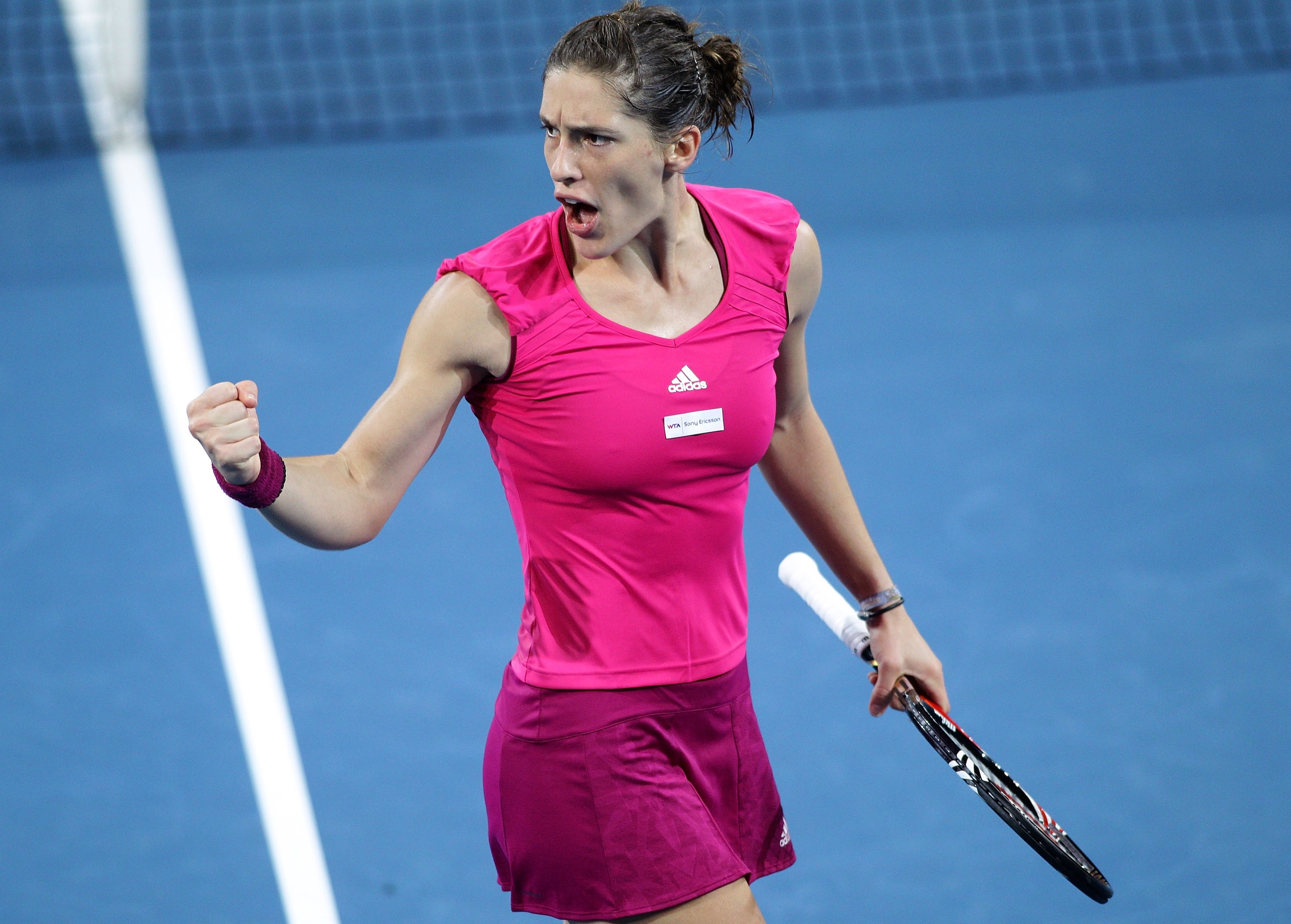 BRISBANE, AUSTRALIA - JANUARY 07:  Andrea Petkovic of Germany celebrates after winning the first set during her semi final match against Marion Bartoli of France during day six of the Brisbane International at Queensland Tennis Centre on January 7, 2011 i