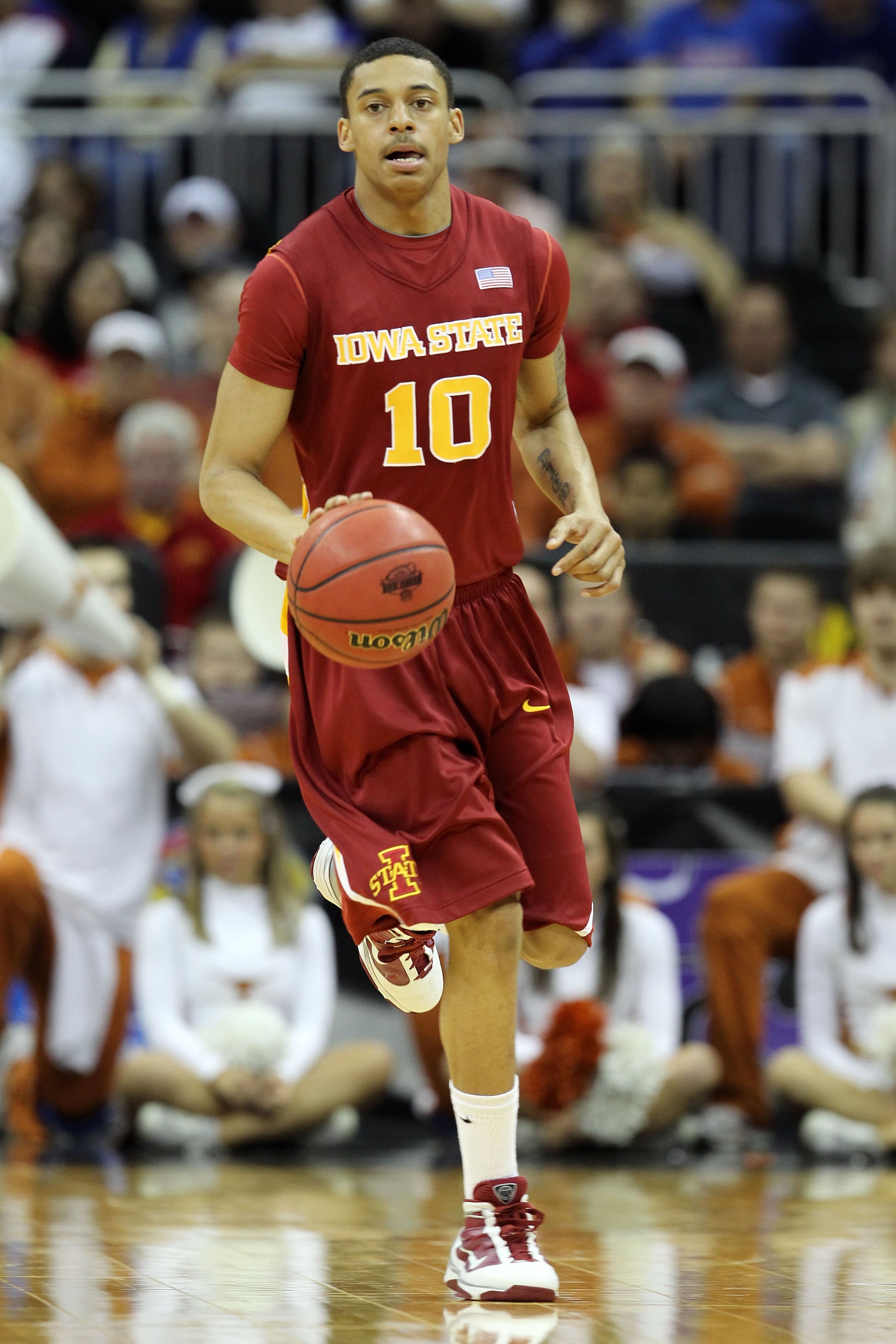 KANSAS CITY, MO - MARCH 10:  Diante Garrett #10 of the Iowa State Cyclones moves the ball against the Texas Longhorns during the first round game of the 2010 Phillips 66 Big 12 Men's Basketball Tournament at the Sprint Center on March 10, 2010 in Kansas C