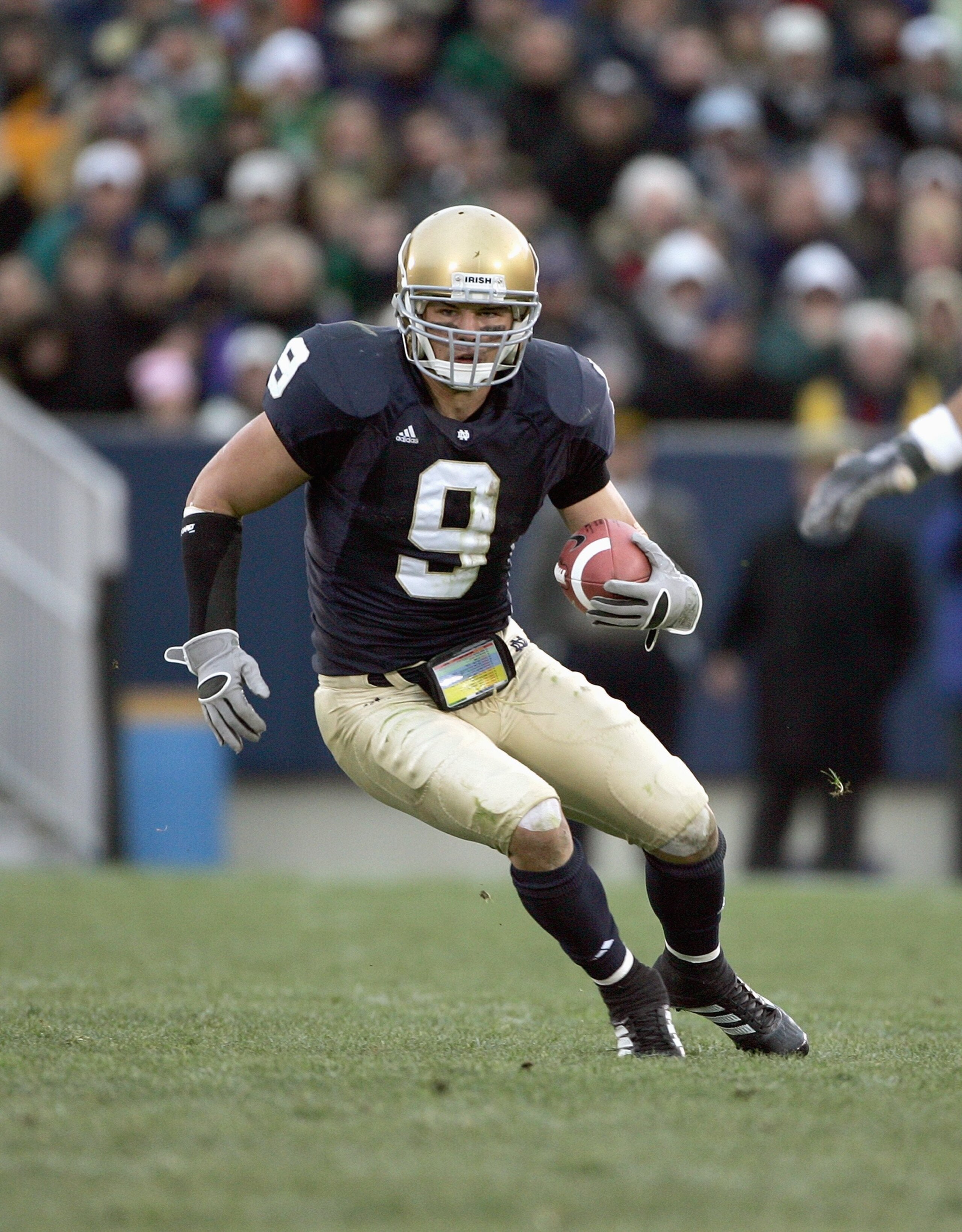 SOUTH BEND, IN - NOVEMBER 4: Tom Zbikowski #9 of the Notre Dame Fighting Irish carries the ball during the game against the North Carolina Tar Heels on November 4, 2006 at Notre Dame Stadium in South Bend, Indiana. (Photo by Jonathan Daniel/Getty Images)