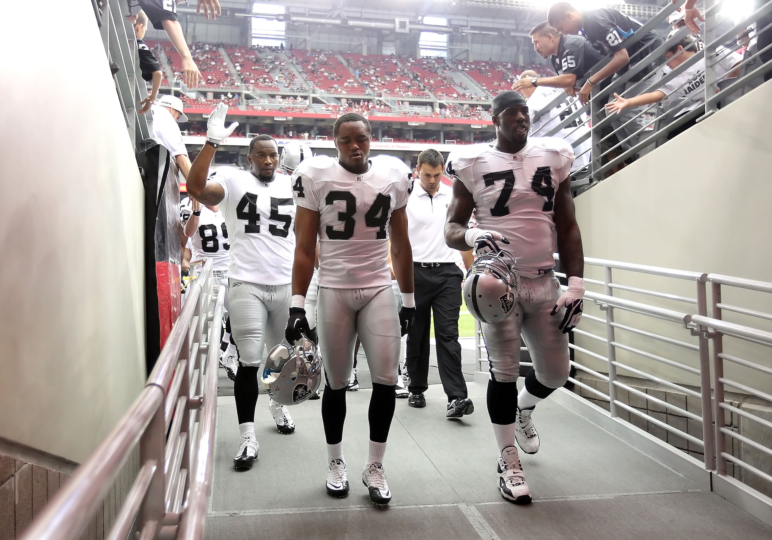 GLENDALE, AZ - SEPTEMBER 26: (L-R) Marcel Reece #45, Mike Mitchell #34 and Bruce Campbell #73 of the Oakland Raiders before the NFL game against the Arizona Cardinals at the University of Phoenix Stadium on September 26, 2010 in Glendale, Arizona. The C GLENDALE, AZ - SEPTEMBER 26: (L-R) Marcel Reece #45, Mike Mitchell #34 and Bruce Campbell #73 of the Oakland Raiders before the NFL game against the Arizona Cardinals at the University of Phoenix Stadium on September 26, 2010 in Glendale, Arizona. The C