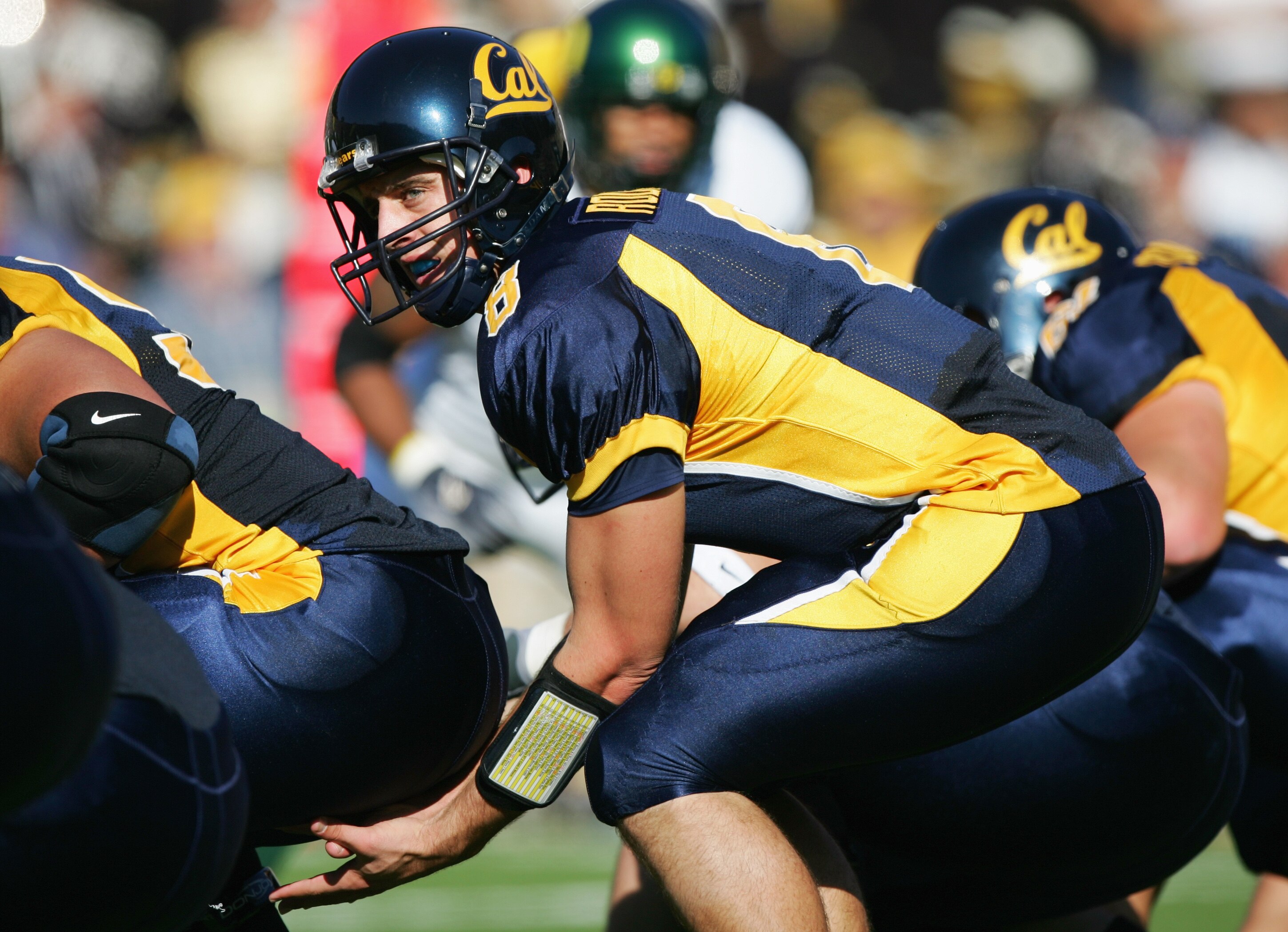 BERKELEY, CA - NOVEMBER 6:  Aaron Rodgers #8 of the California Golden Bears lines up under center during the game against the Oregon Ducks at Memorial Stadium on November 6, 2004 in Berkeley, California. The Bears defeated the Ducks 28-27.  (Photo by Jed