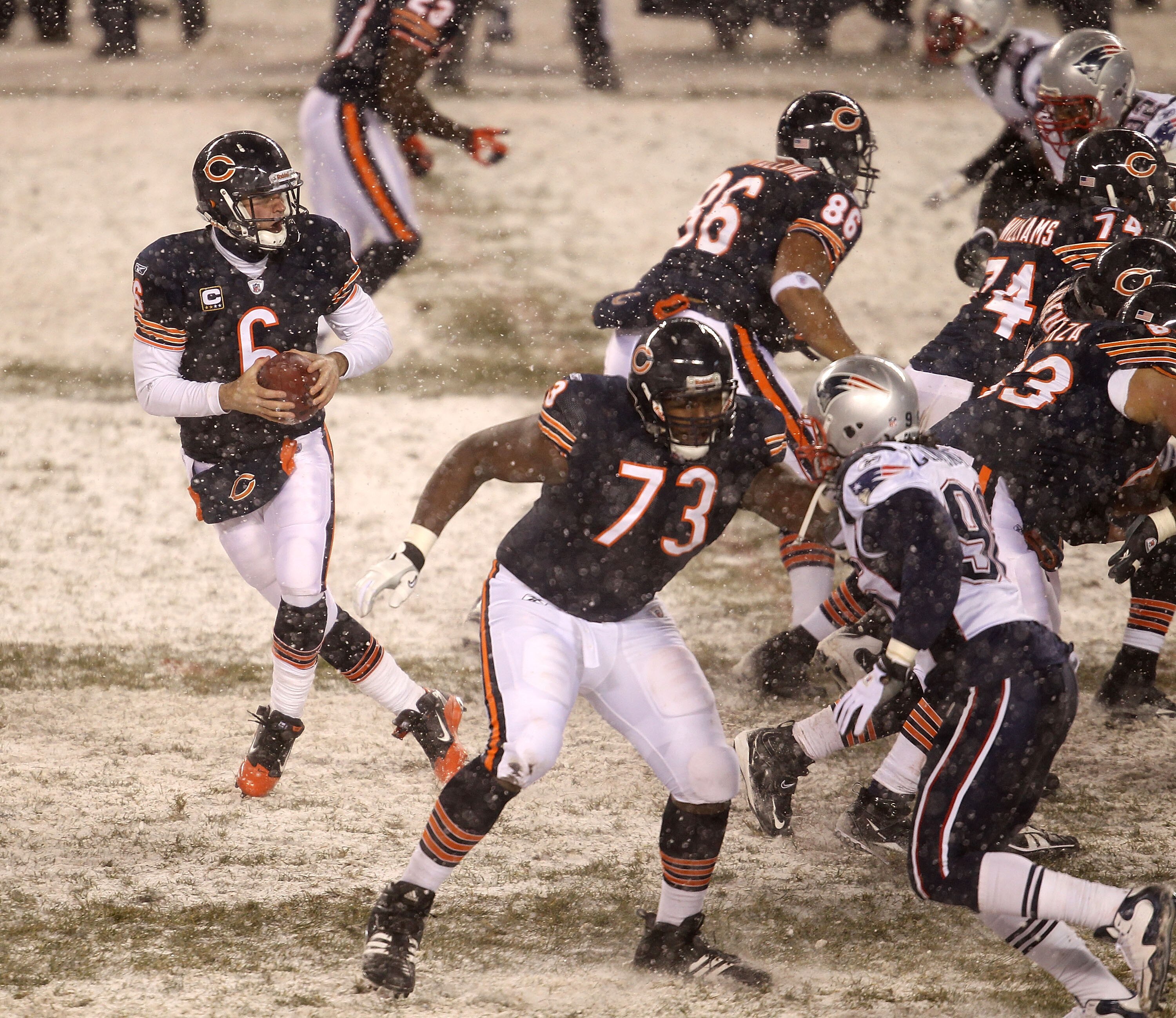 CHICAGO, IL - DECEMBER 12: Jay Cutler #6 of the Chicago Bears drops back to pass as J'Marcus Webb #73 moves to block against the New England Patriots at Soldier Field on December 12, 2010 in Chicago, Illinois. The Patriots defeated the Bears 36-7. (Photo