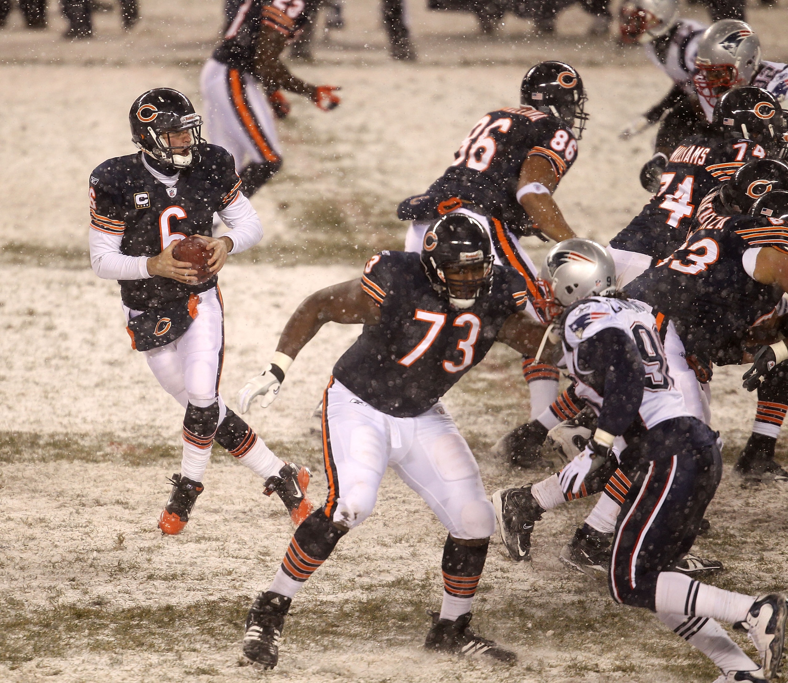 CHICAGO, IL - DECEMBER 12: Jay Cutler #6 of the Chicago Bears drops back to pass as J'Marcus Webb #73 moves to block against the New England Patriots at Soldier Field on December 12, 2010 in Chicago, Illinois. The Patriots defeated the Bears 36-7. (Photo