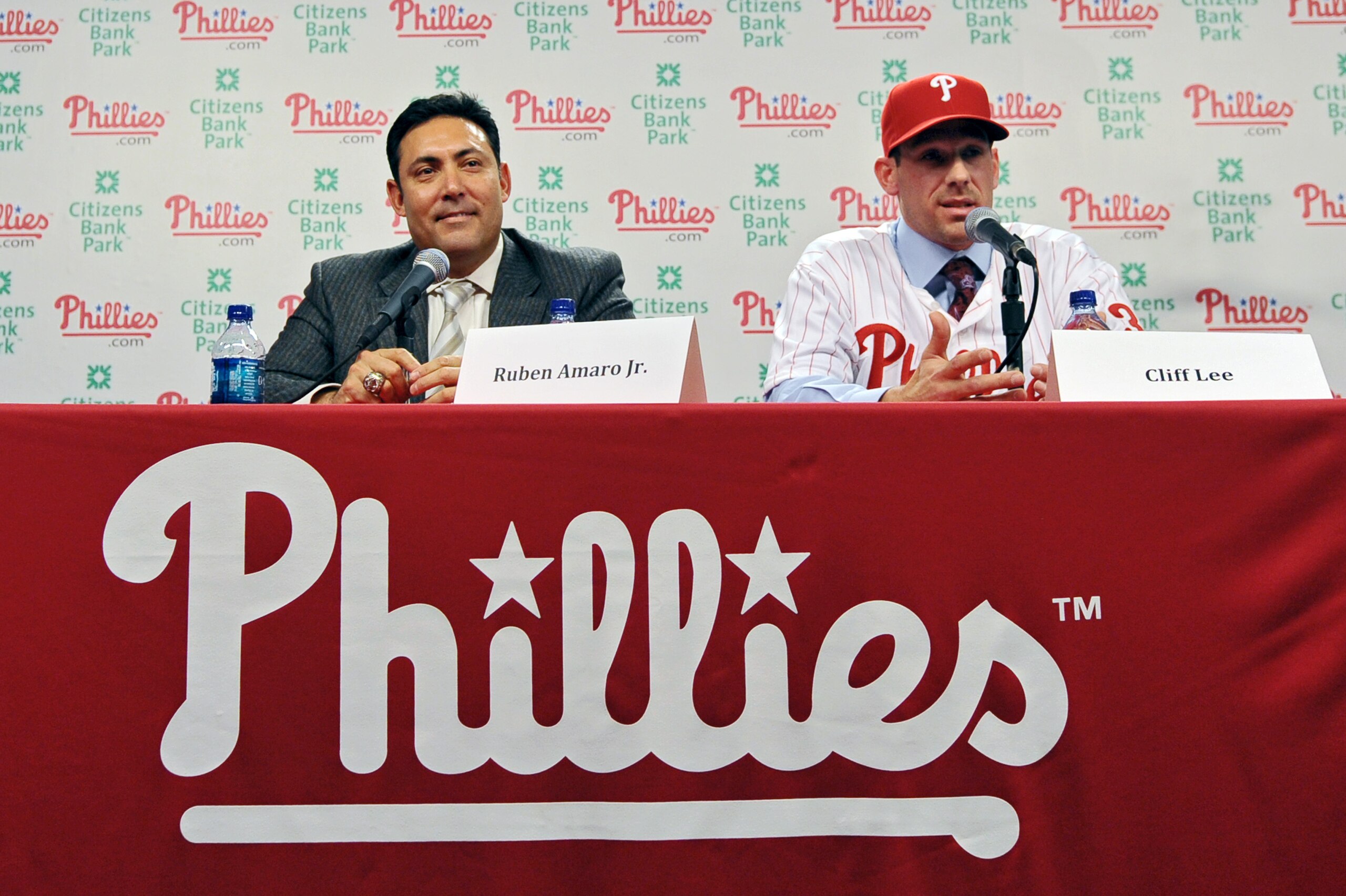PHILADELPHIA - DECEMBER 15: Pitcher Cliff Lee #33 of the Philadelphia Phillies talks with the media while general manager Ruben Amaro Jr. watches during a press conference at Citizens Bank Park on December 15, 2010 in Philadelphia, Pennsylvania. (Photo by PHILADELPHIA - DECEMBER 15: Pitcher Cliff Lee #33 of the Philadelphia Phillies talks with the media while general manager Ruben Amaro Jr. watches during a press conference at Citizens Bank Park on December 15, 2010 in Philadelphia, Pennsylvania. (Photo by