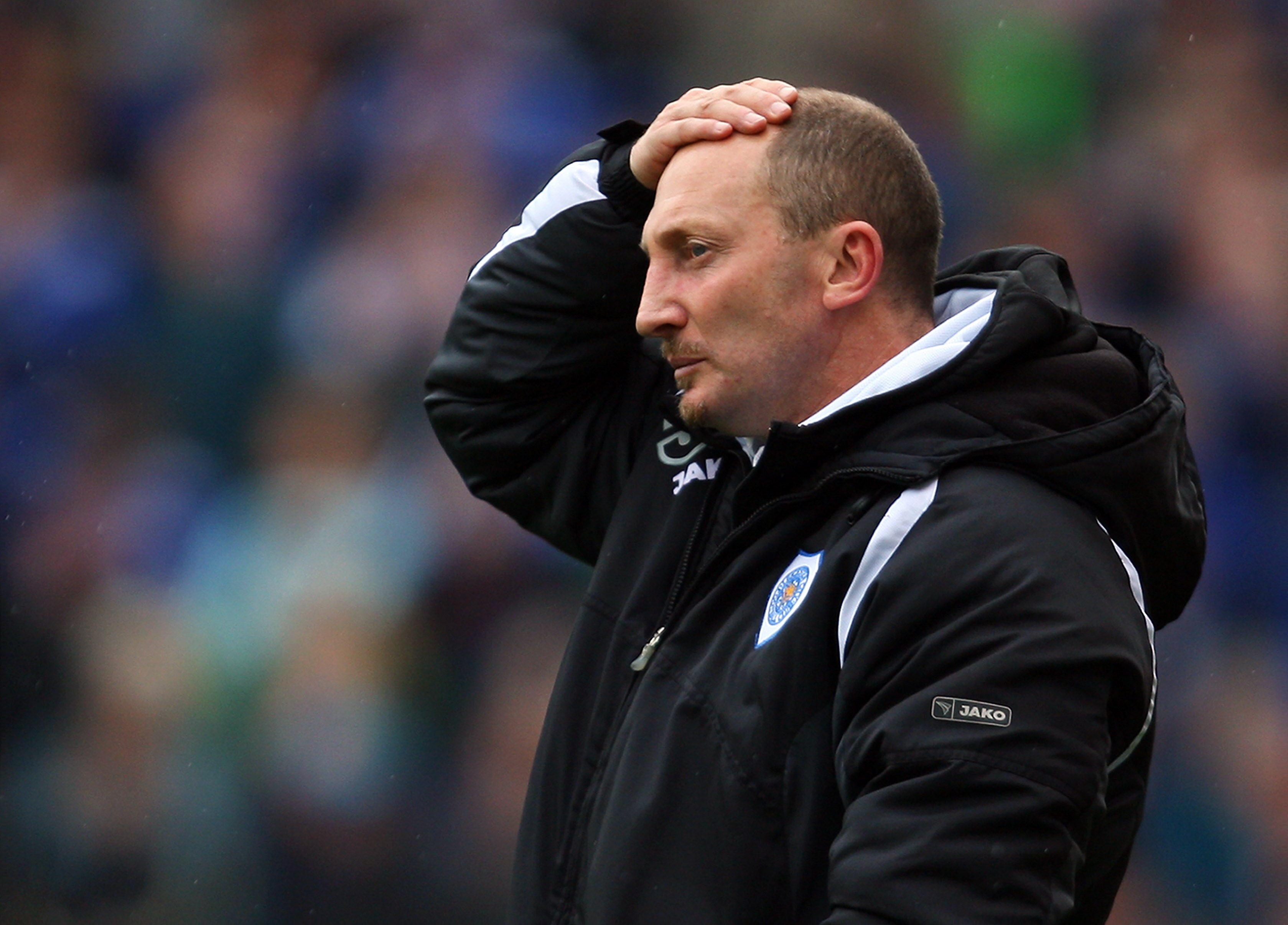 STOKE-ON-TRENT, UNITED KINGDOM - MAY 04:   Leicester Manager Ian Holloway holds his head during the Coca-Cola Championship match between Stoke City and Leicester City at Britannia Stadium on May 4, 2008 in Stoke, England.  (Photo by Mark Thompson/Getty Im