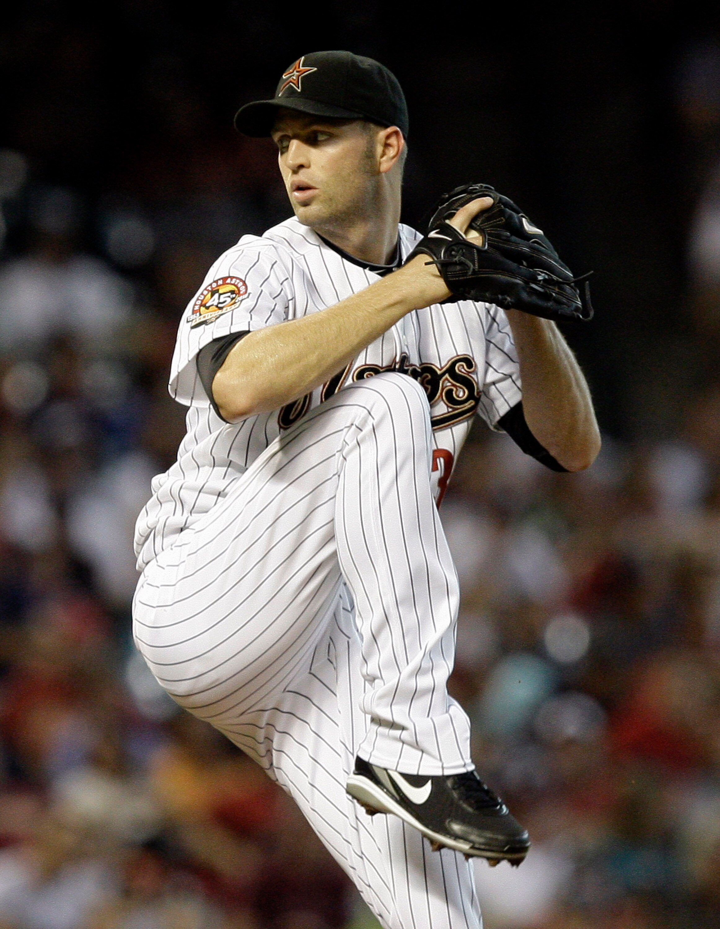 HOUSTON - AUGUST 10:  Pitcher J.A. Happ #30 of the Houston Astros throws against the Atlanta Braves in the first inning at Minute Maid Park on August 10, 2010 in Houston, Texas.  (Photo by Bob Levey/Getty Images)