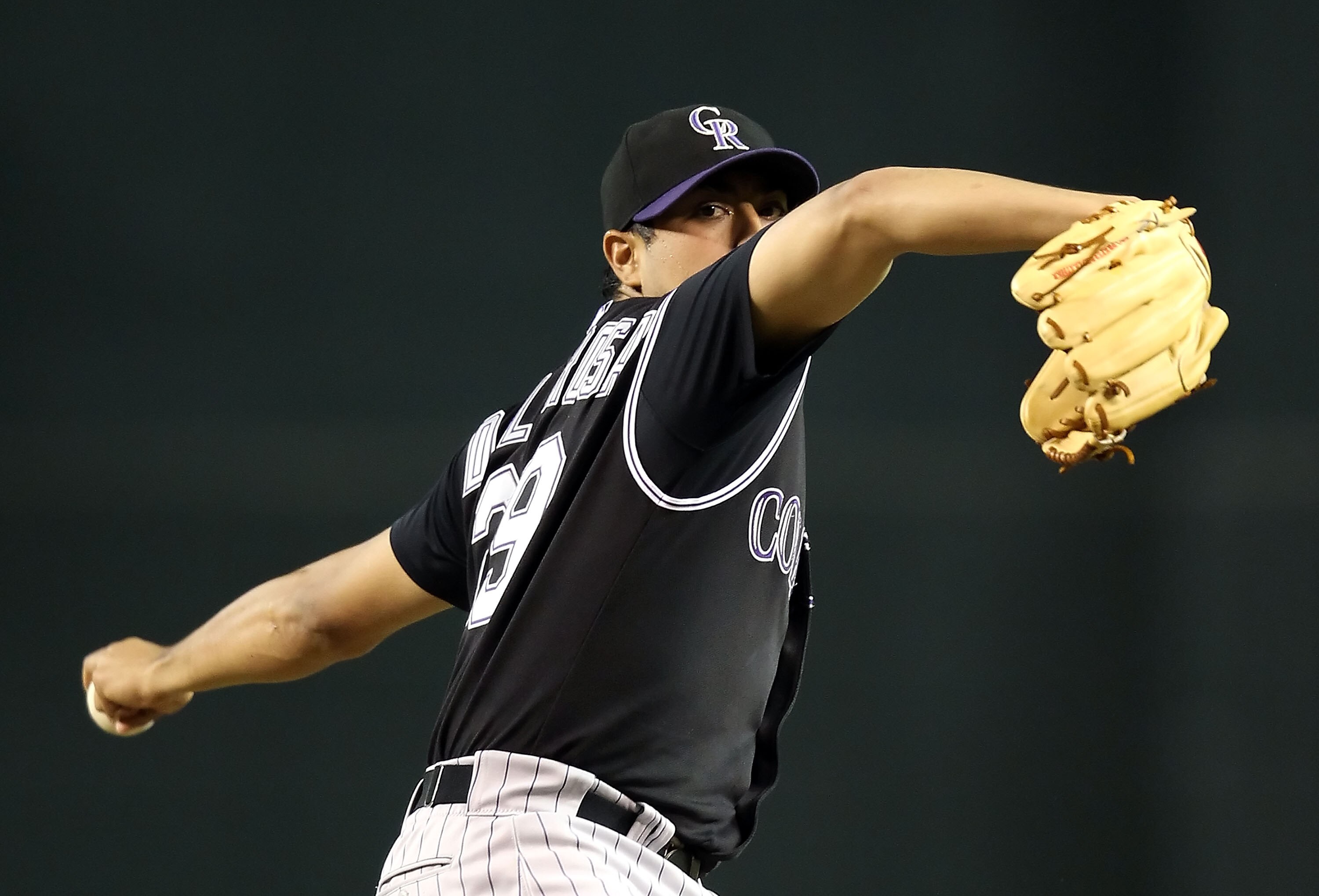 PHOENIX - SEPTEMBER 21:  Starting pitcher Jorge De La Rosa #29 of the Colorado Rockies pitches against the Arizona Diamondbacks during the Major League Baseball game at Chase Field on September 21, 2010 in Phoenix, Arizona.  (Photo by Christian Petersen/G