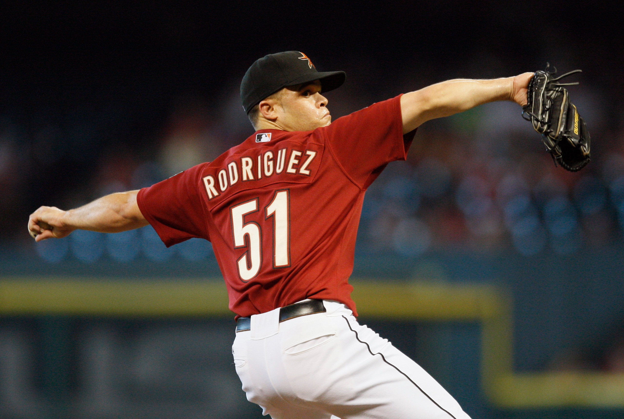 HOUSTON - JULY 25:  Pitcher Wandy Rodriguez #51 of the Houston Astros pitches against the Cincinnati Reds at Minute Maid Park on July 25, 2010 in Houston, Texas. Houston defeated Cincinnati 4-0.  (Photo by Bob Levey/Getty Images)