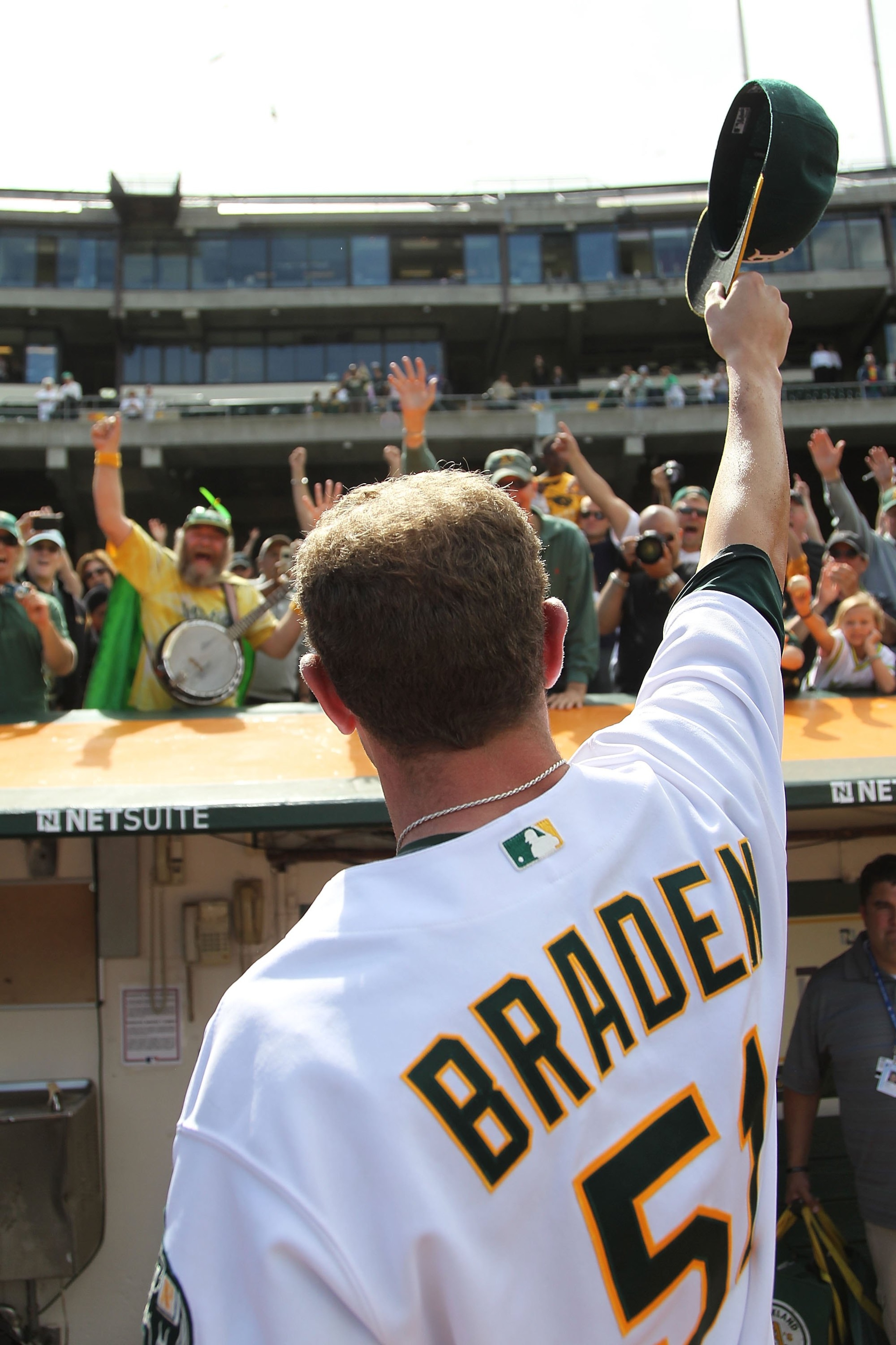 OAKLAND, CA - MAY 09:  Dallas Braden #51 of the Oakland Athletics celebrates after pitching a perfect game against the Tampa Bay Rays during an MLB game at the Oakland-Alameda County Coliseum on May 9, 2010 in Oakland, California.  (Photo by Jed Jacobsohn