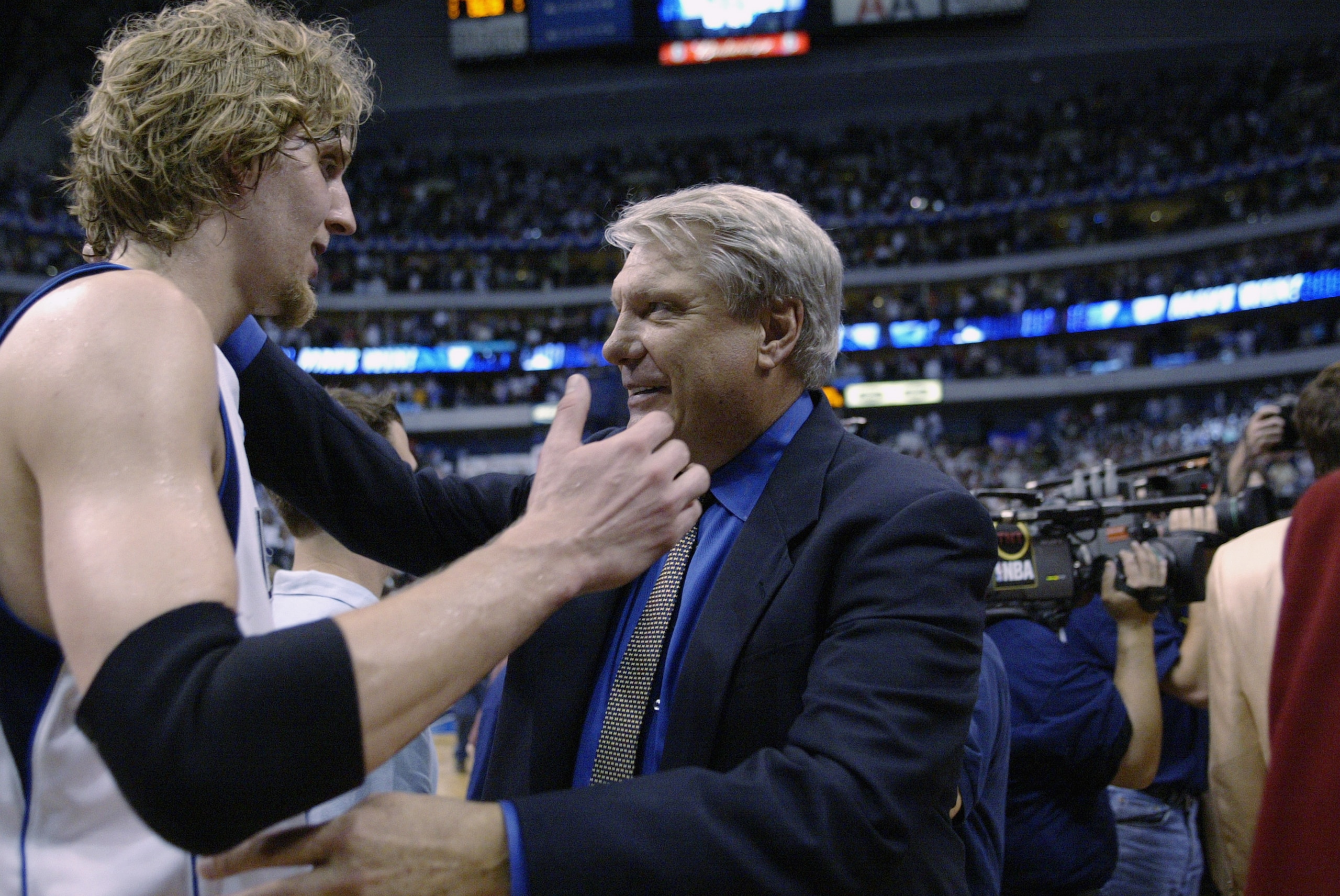 DALLAS - MAY 17:  Dirk Nowitzki #41 of the Dallas Mavericks congratulates his head coach Don Nelson after wining Game Seven of the Western Conference Semifinals against the Sacramento Kings during the 2003 NBA Playoffs at the American Airlines Center on M