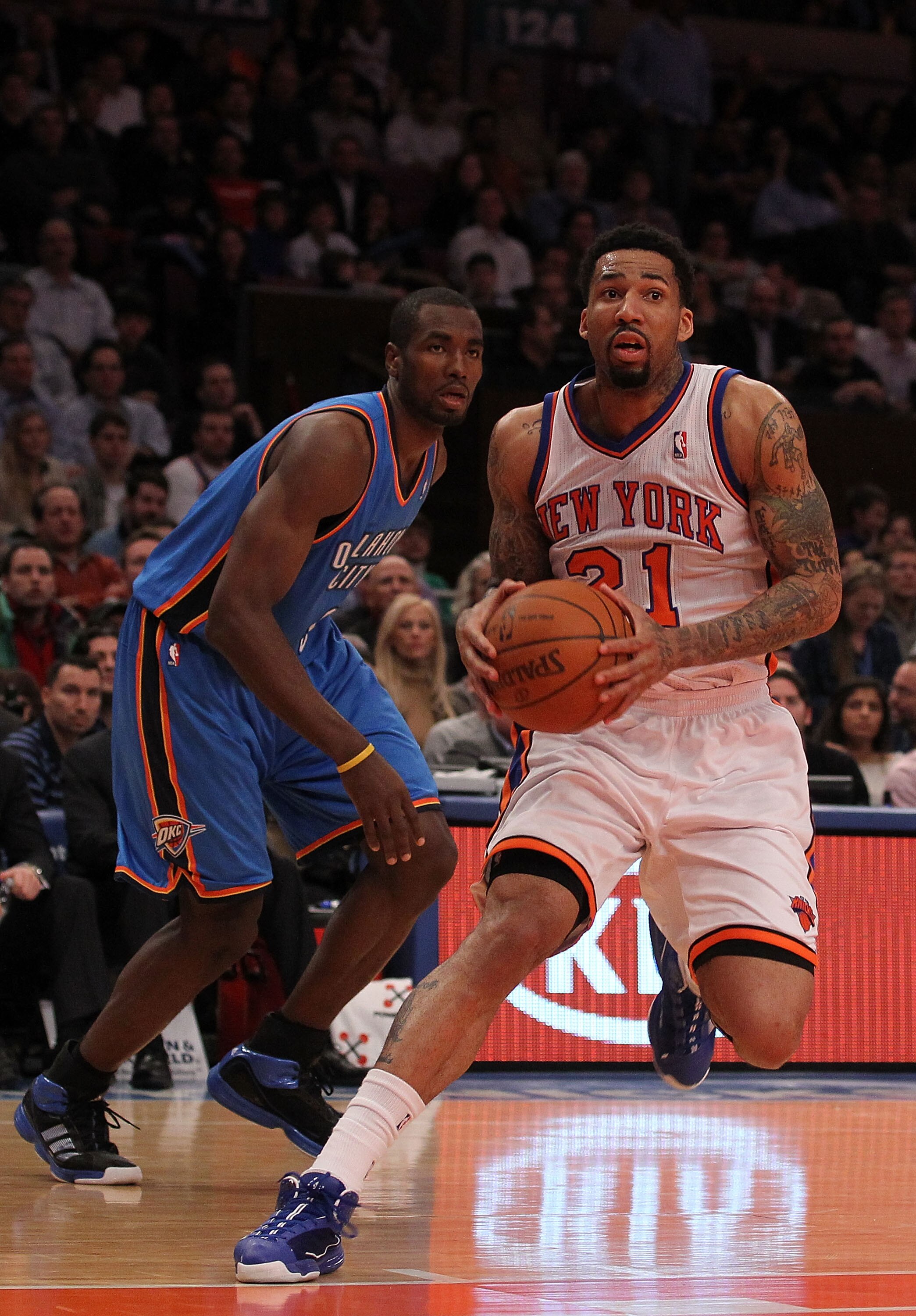 NEW YORK - DECEMBER 22:  Wilson Chandler #21 of the New York Knicks in action against  the Oklahoma City Thunder at Madison Square Garden on December 22, 2010 in New York, New York.   NOTE TO USER: User expressly acknowledges and agrees that, by downloadi