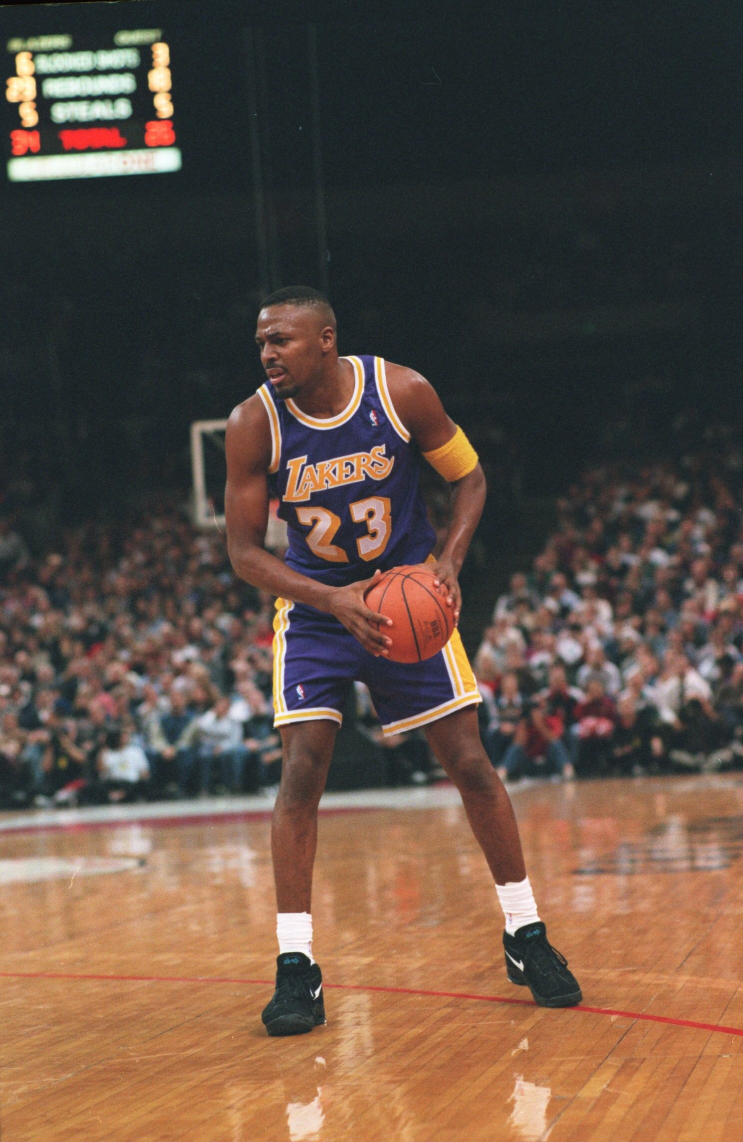 11 Jan 1995: CEDRIC CEBALLOS, FORWARD FOR THE LOS ANGELES LAKERS, LOOKS TO MAKE A MOVE DURING THEIR 129-83 LOSS TO THE PORTLAND TRAIL BLAZERS IN PORTLAND, OREGON.