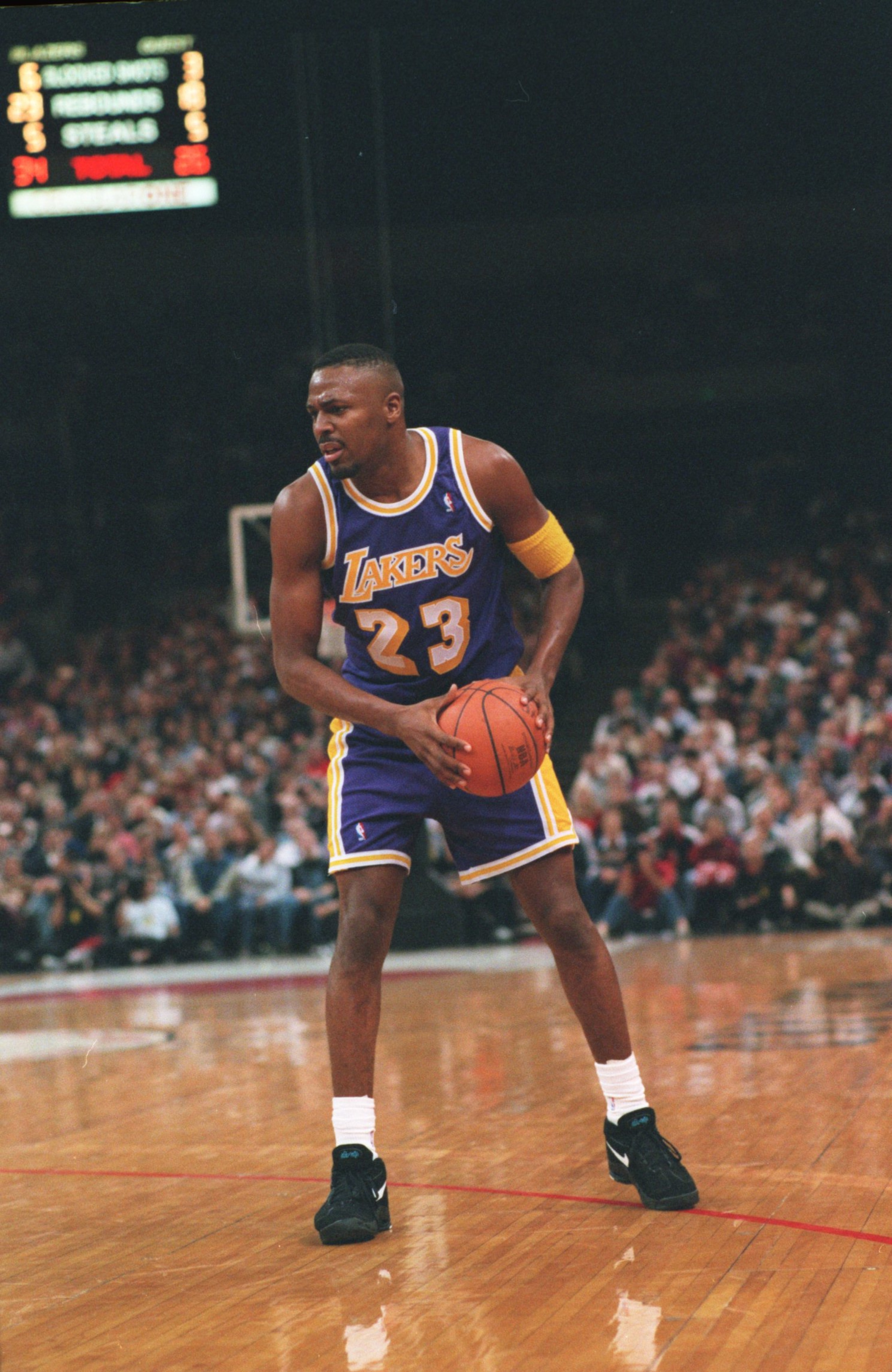 11 Jan 1995: CEDRIC CEBALLOS, FORWARD FOR THE LOS ANGELES LAKERS, LOOKS TO MAKE A MOVE DURING THEIR 129-83 LOSS TO THE PORTLAND TRAIL BLAZERS IN PORTLAND, OREGON.