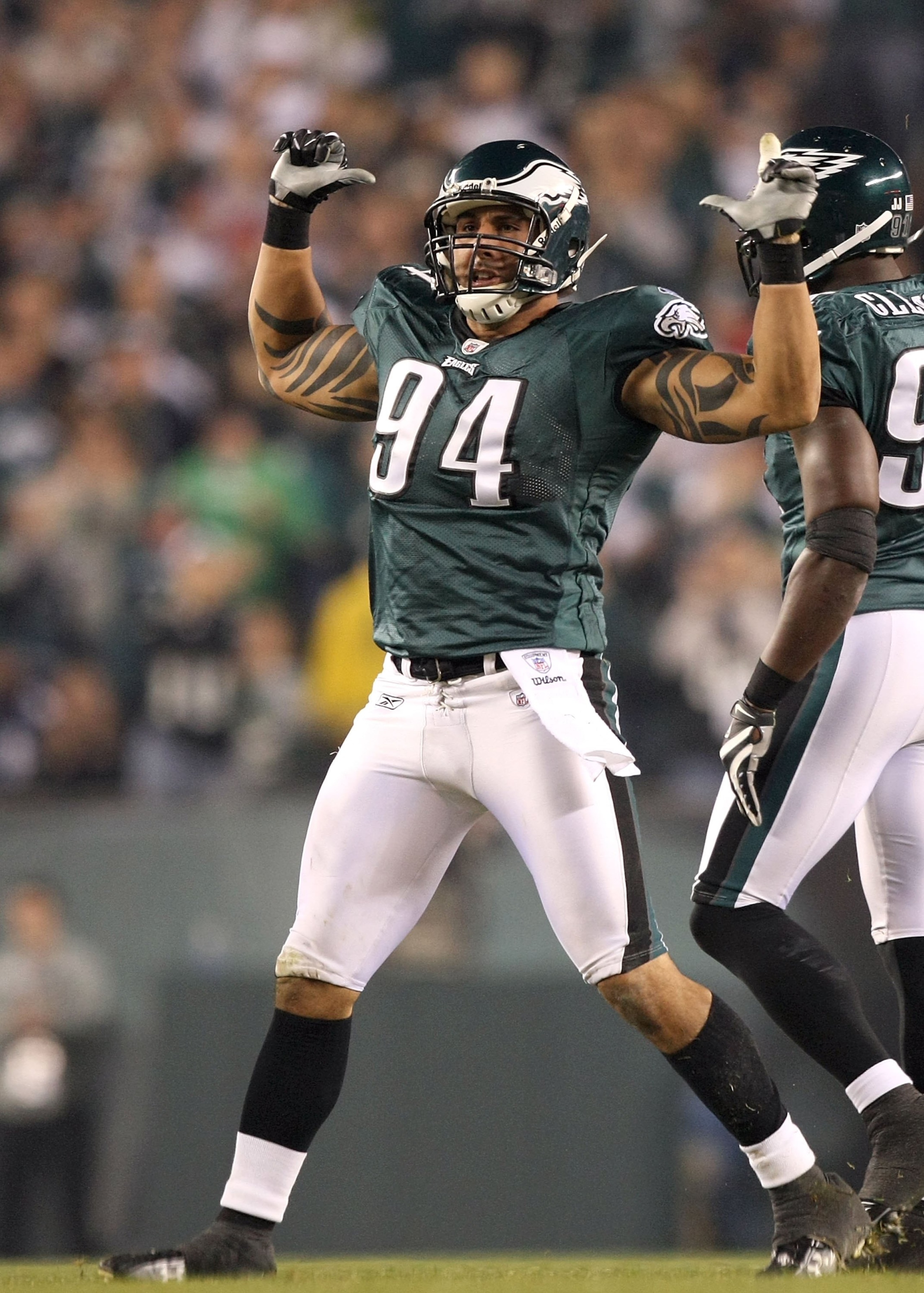 PHILADELPHIA - NOVEMBER 08: Jason Babin #94 of the Philadelphia Eagles celebrate after he sacked quarterback Tony Romo #9 of the Dallas Cowboys in the second quarter at Lincoln Financial Field on November 8, 2009 in Philadelphia, Pennsylvania. (Photo by PHILADELPHIA - NOVEMBER 08: Jason Babin #94 of the Philadelphia Eagles celebrate after he sacked quarterback Tony Romo #9 of the Dallas Cowboys in the second quarter at Lincoln Financial Field on November 8, 2009 in Philadelphia, Pennsylvania. (Photo by