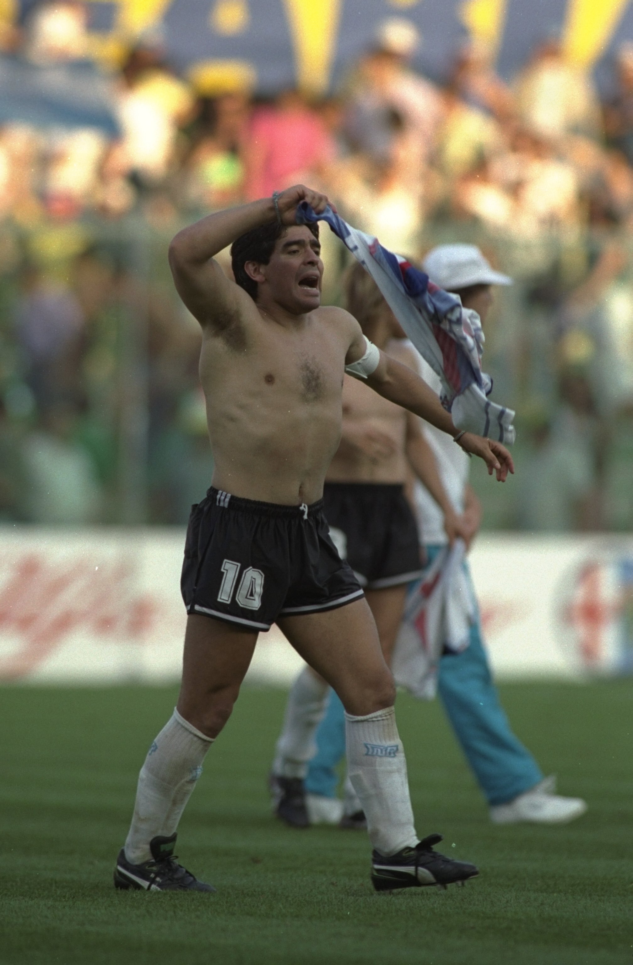 3 Jul 1990:  Diego Maradona #10 of Argentina celebrates their victory after the World Cup Semi-Final against Italy at the San Paolo stadium in Naples, Italy. The ended in a 1-1 draw but Argentina won 4-3 on penalties \ Mandatory Credit: Simon  Bruty/Allsp