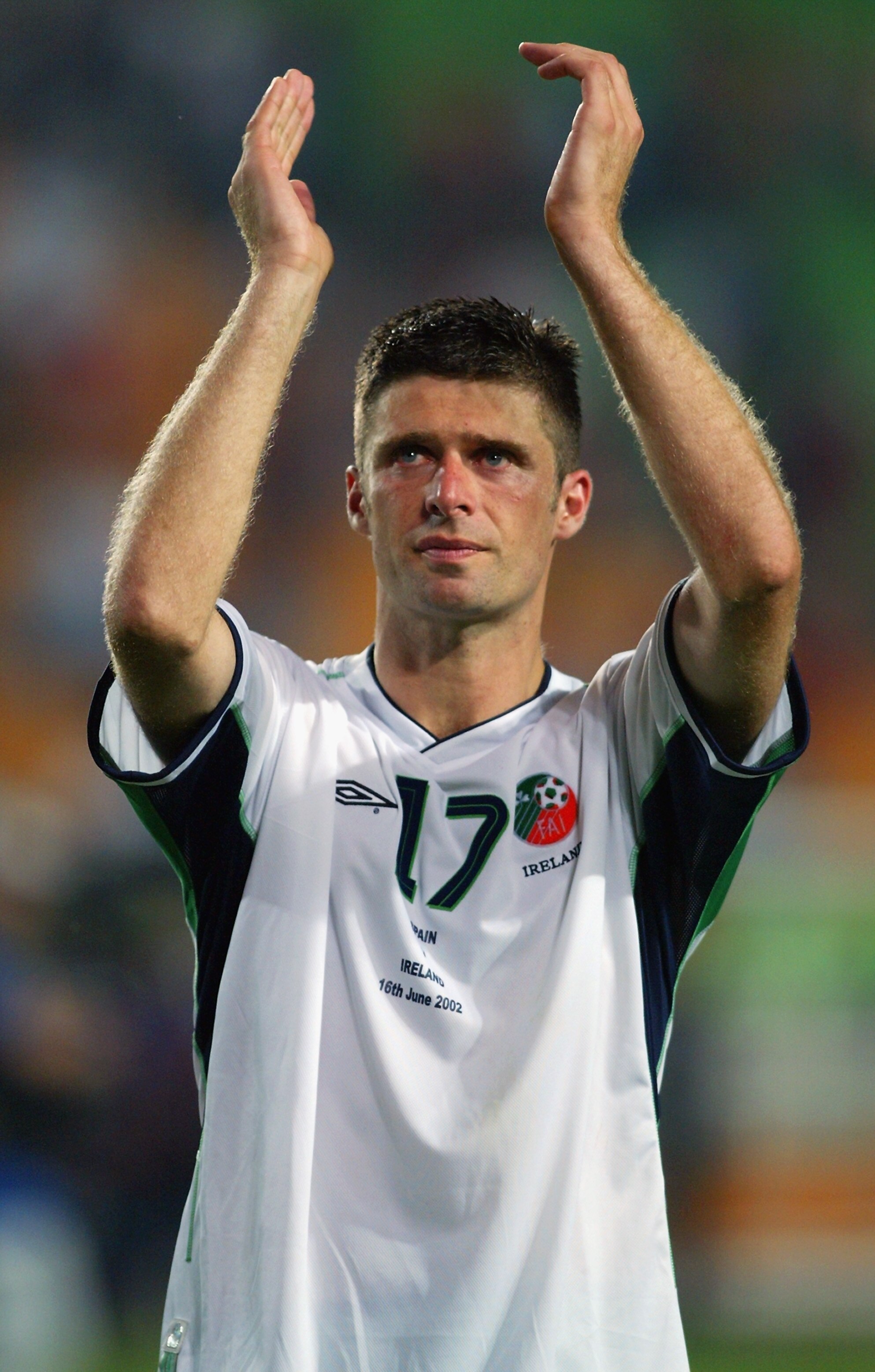 SUWON - JUNE 16:  Niall Quinn of the Republic of Ireland applauds the fans after defeat in the penalty shoot-out after the FIFA World Cup Finals 2002 Second Round match between Spain and Republic of Ireland played at the Suwon World Cup Stadium, in Suwon,