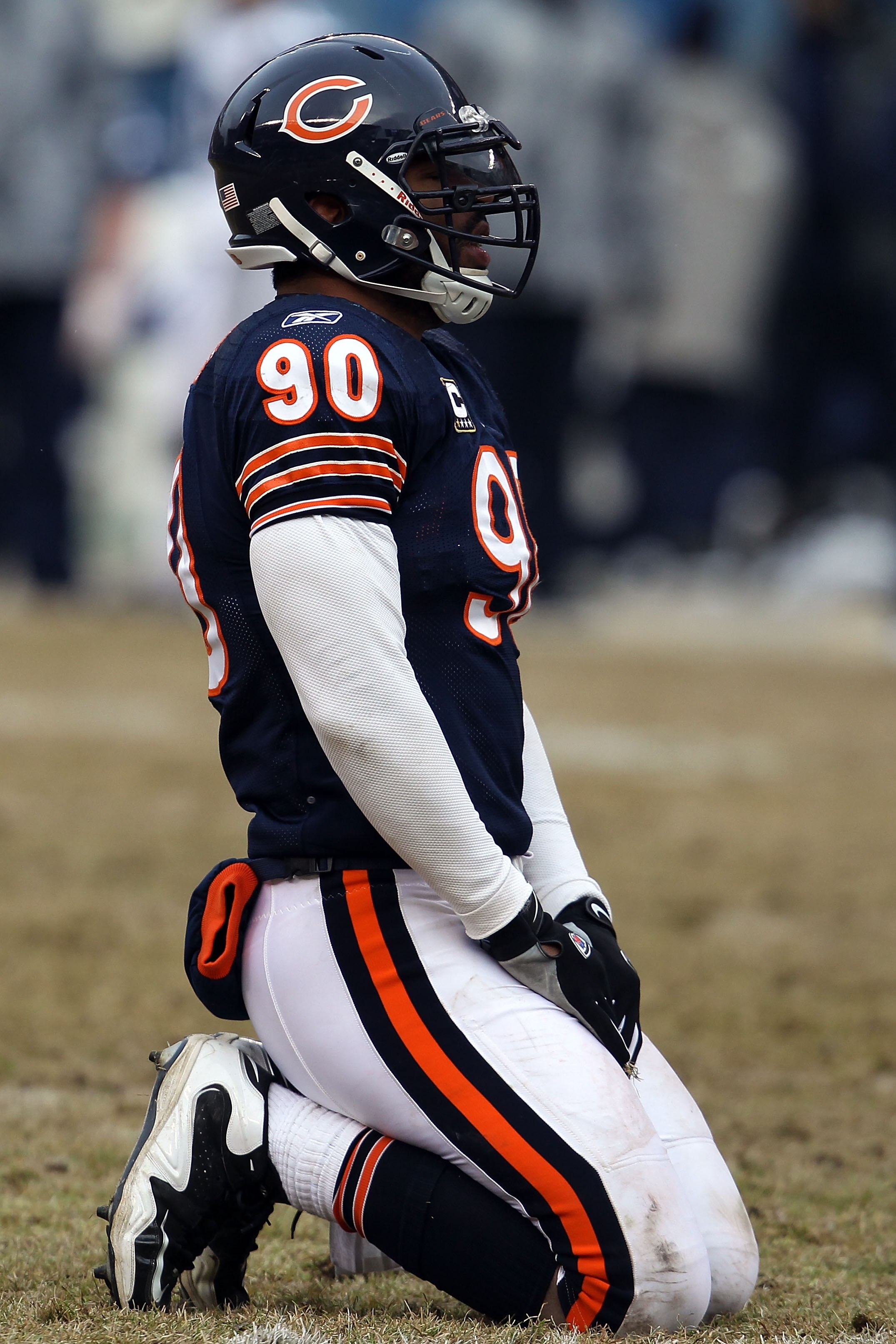 CHICAGO, IL - JANUARY 16:  Julius Peppers #90 of the Chicago Bears looks on against the Seattle Seahawks in the 2011 NFC divisional playoff game at Soldier Field on January 16, 2011 in Chicago, Illinois.  (Photo by Jonathan Daniel/Getty Images)