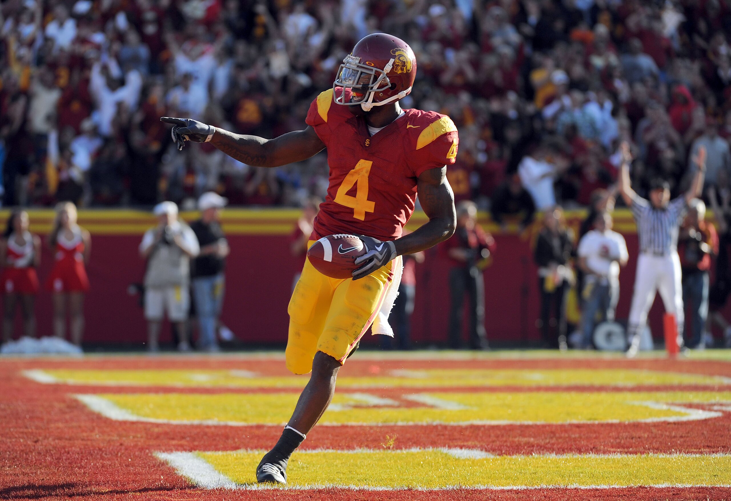 LOS ANGELES, CA - NOVEMBER 14:  Joe McKnight #4 of the USC Trojans celebrates his touchdown against the Stanford Cardinals during the second half at the Los Angeles Memorial Coliseum on November 14, 2009 in Los Angeles, California.  (Photo by Harry How/Ge