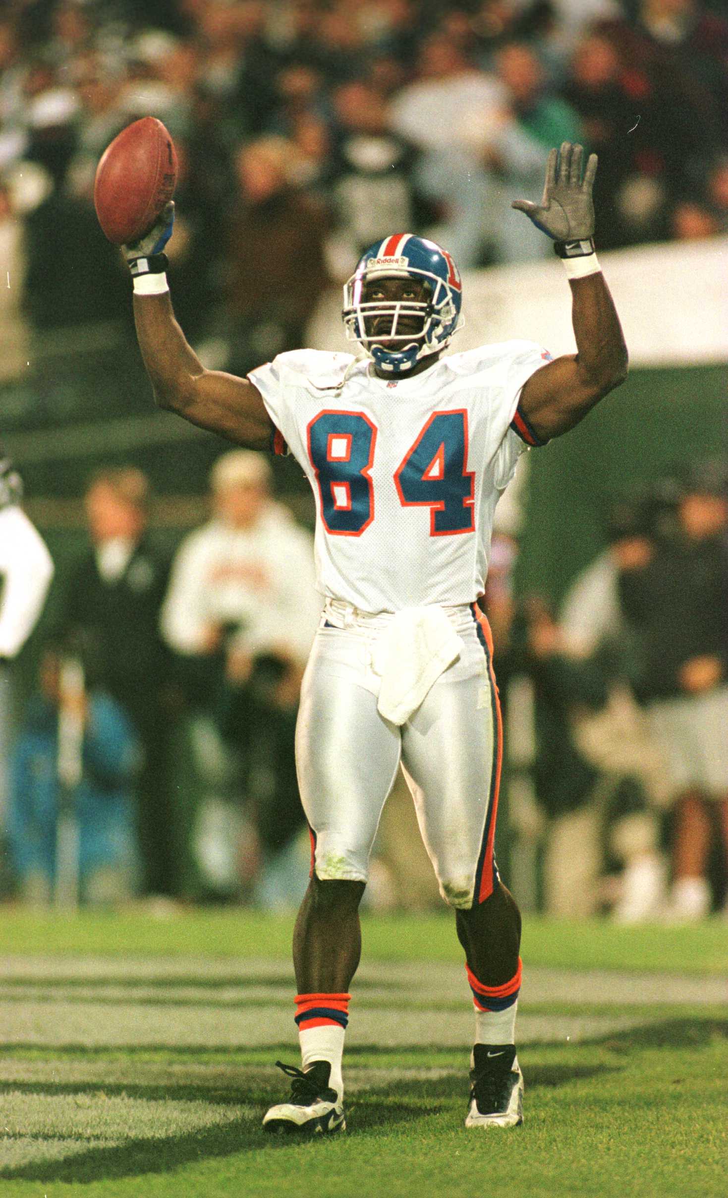 4 Nov 1996:  Shannon Sharpe #84 of the Denver Broncos celebrates his first quarter touchdown reception during the Monday night game against the Oakland Raiders at Oakland-Alameda County Coliseum in Oakland, California. Mandatory Credit: Todd Warshaw/Allsp
