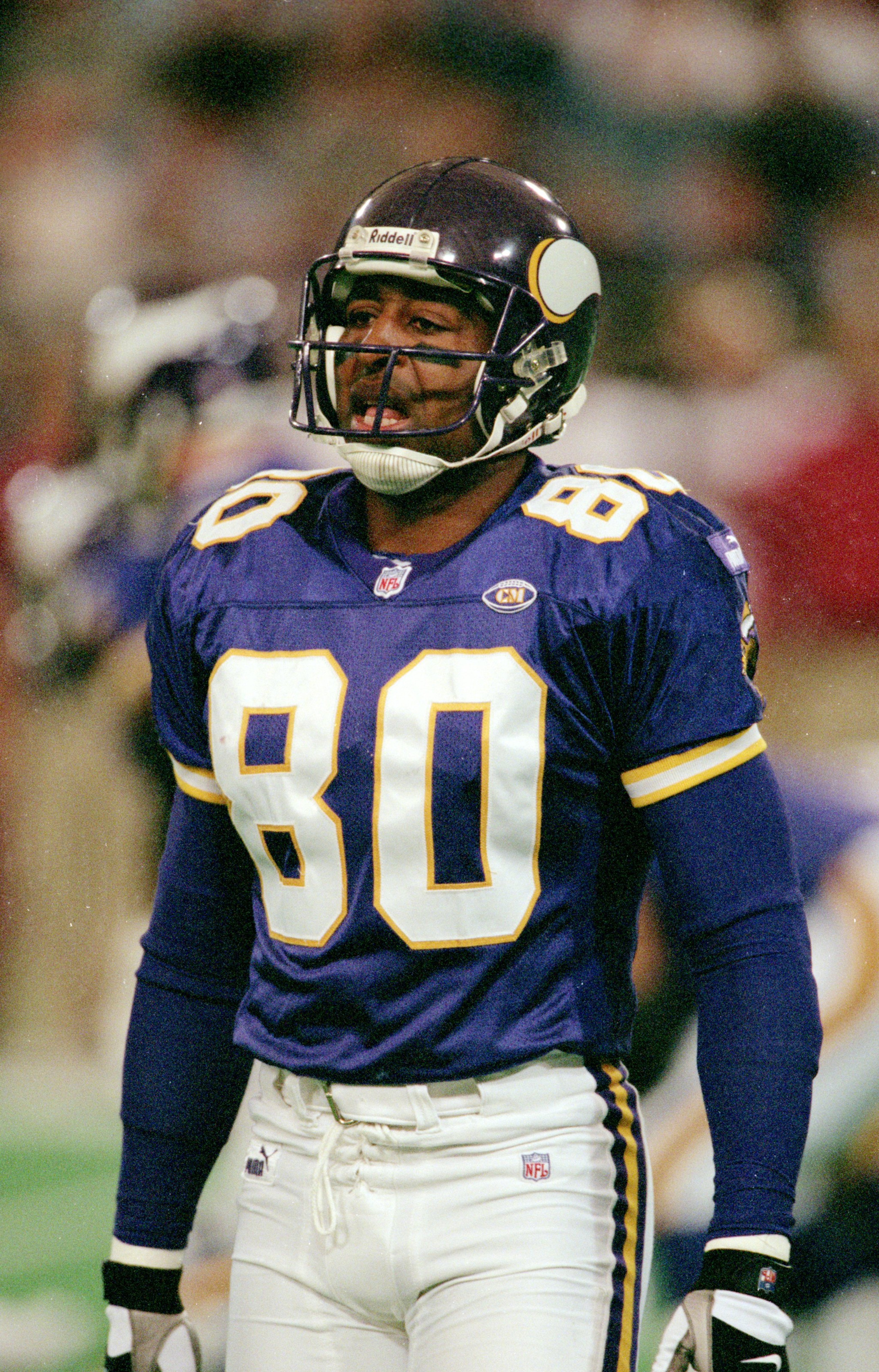 24 Oct 1999: Cris Carter #80 of the Minnesota Vikings looks on the sidelines during a game against the San Francisco 49ers at the Metrodome in Minneapolis, Minnesota. The Vikings defeated the 49ers 40-16. Mandatory Credit: Tom Pidgeon  /Allsport