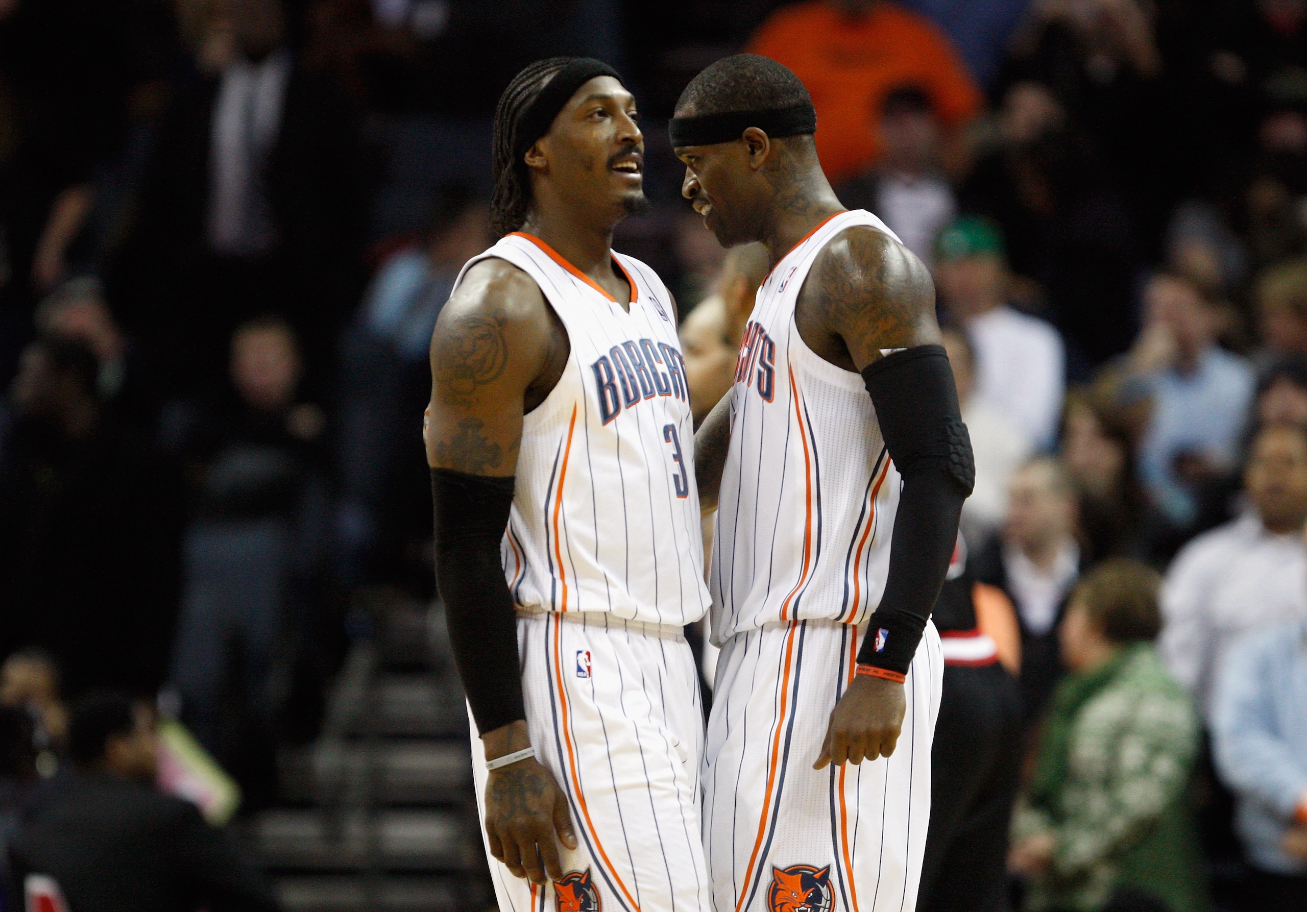 CHARLOTTE, NC - JANUARY 12:  Teammates Gerald Wallace #3 and Stephen Jackson #1 of the Charlotte Bobcats react during their 96-91 victory over the Chicago Bulls at Time Warner Cable Arena on January 12, 2011 in Charlotte, North Carolina. NOTE TO USER: Use
