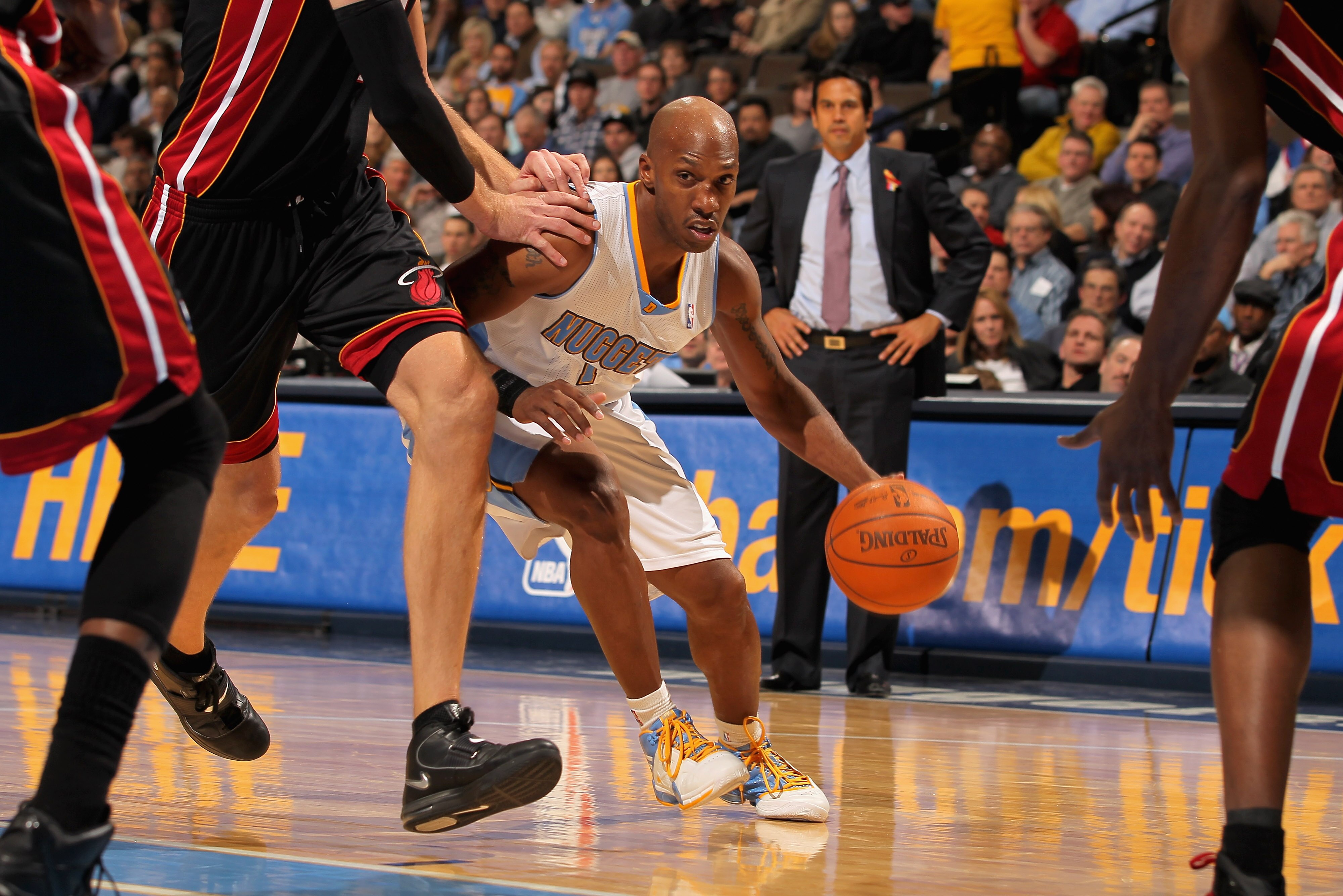 DENVER, CO - JANUARY 13:  Chauncey Billups #1 of the Denver Nuggets drives against the Miami Heat defense at the Pepsi Center on January 13, 2011 in Denver, Colorado. The Nuggets defeated the Heat 130-102. NOTE TO USER: User expressly acknowledges and agr