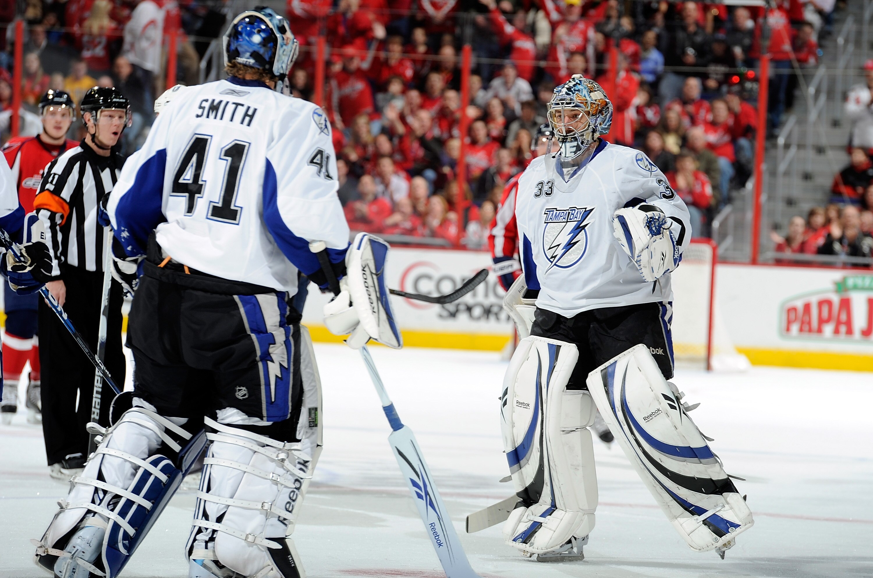 WASHINGTON - NOVEMBER 26:  Dan Ellis #33 replaces Mike Smith #41 of the Tampa Bay Lightning skate in the second period of the game against the Washington Capitals at the Verizon Center on November 26, 2010 in Washington, DC.  (Photo by Greg Fiume/Getty Im